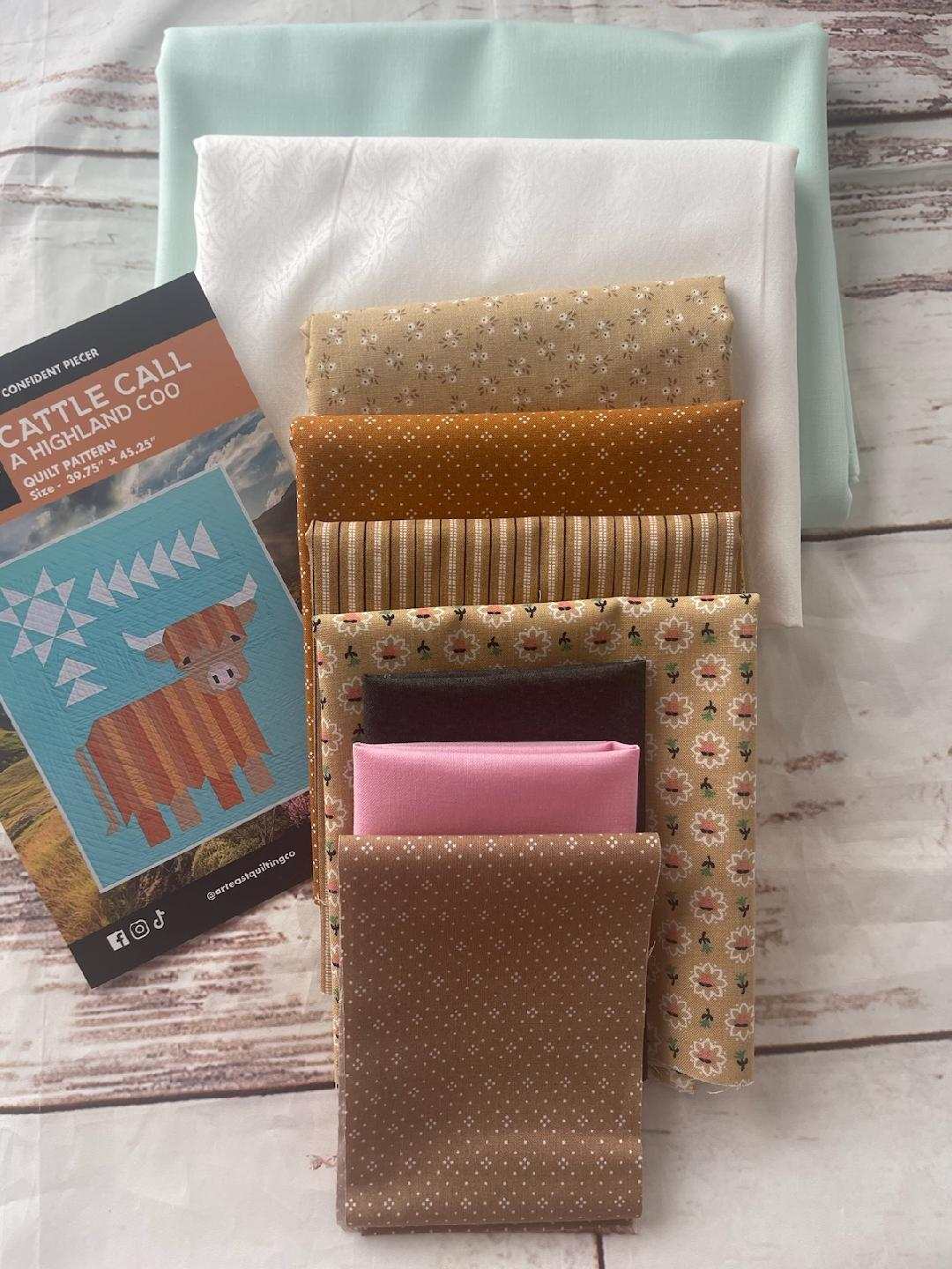Cattle Call Quilt Kit featuring highland cow design with fabric and pattern for 40x45 inch quilt top and binding