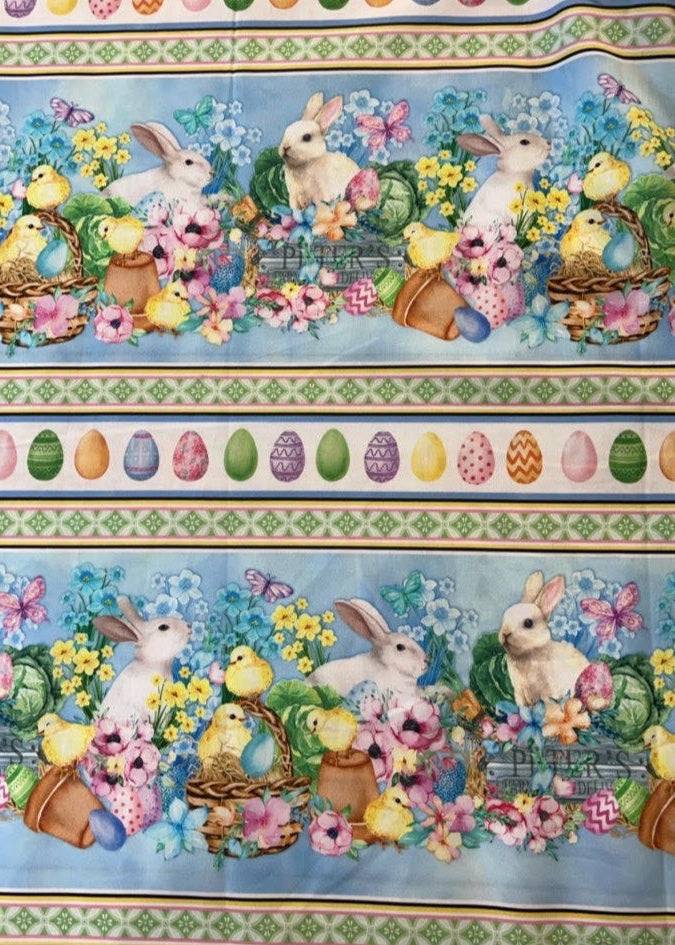 Cottontail Farms Easter-themed striped cotton fabric with rabbits, chicks, flowers, and colorful Easter eggs pattern by Nicole Decamp for Benartex