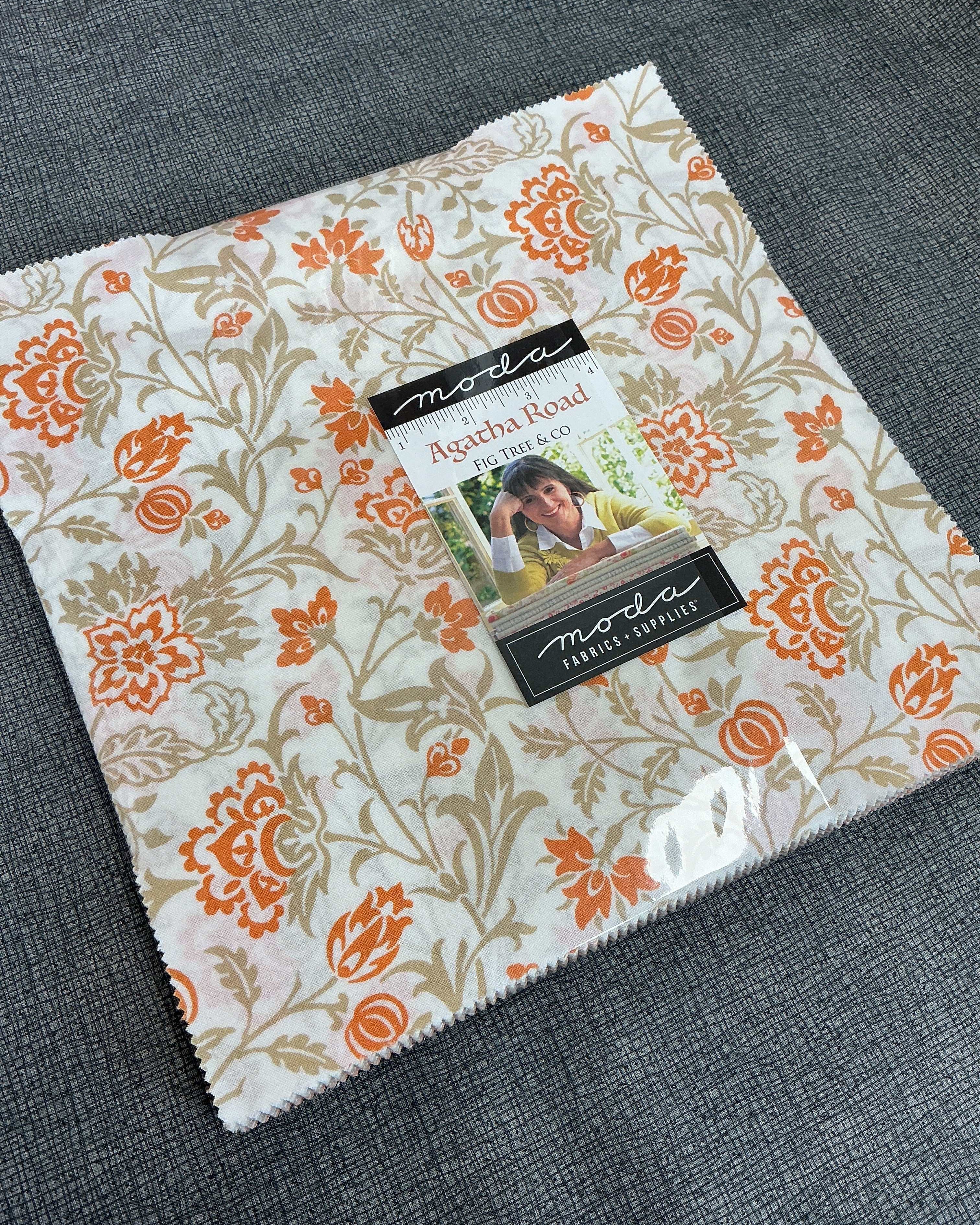 Frida Lap Size Quilt Kit with 12 fabric half-yard cuts, digital pattern, accent, and binding for lap quilt sewing project