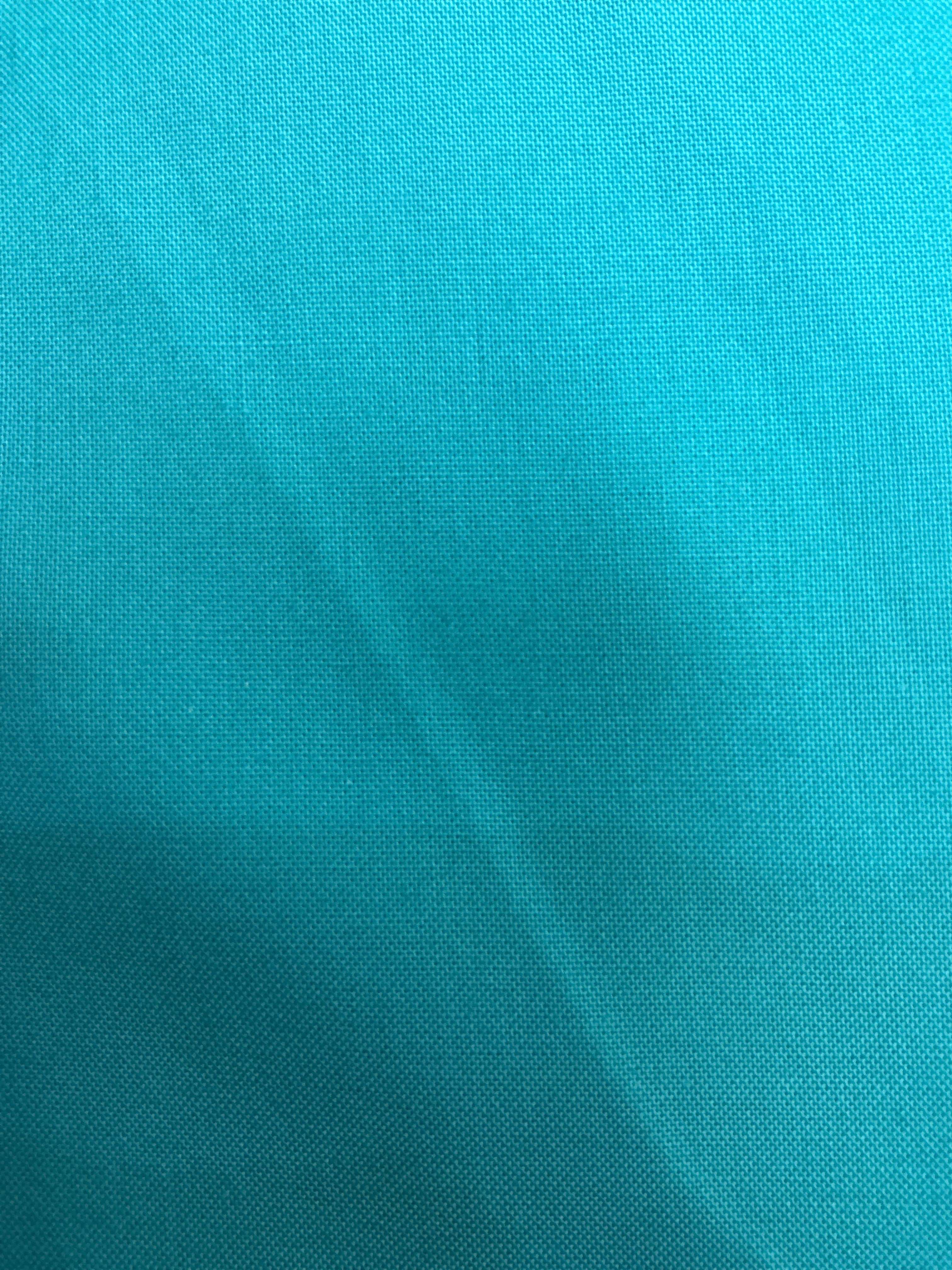 Stack of colorful 5-yard fabric cuts for sale