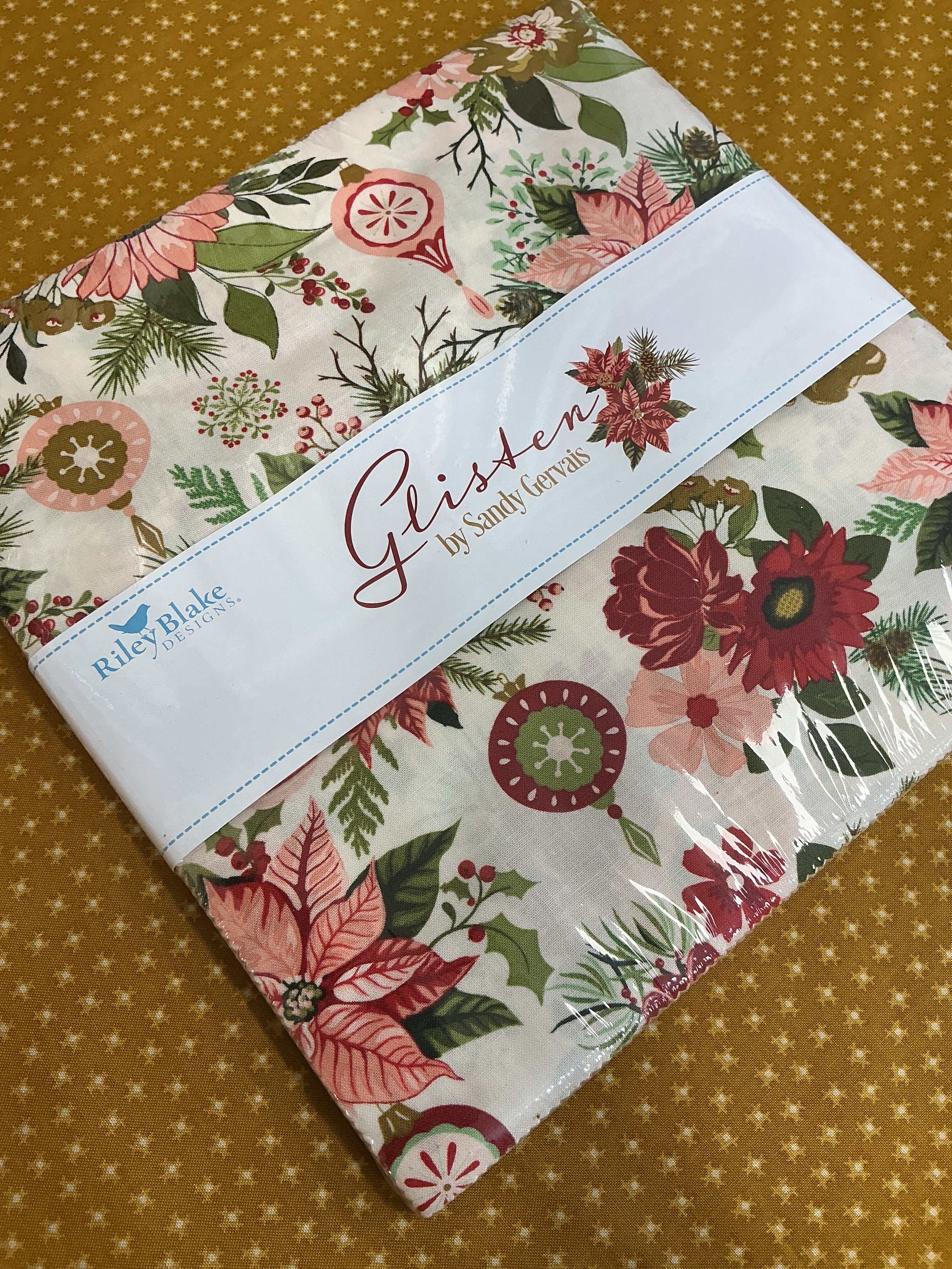 Frida Lap Size Quilt Kit with colorful half-yard fabric cuts, digital pattern, accent, and binding for sewing lap quilt