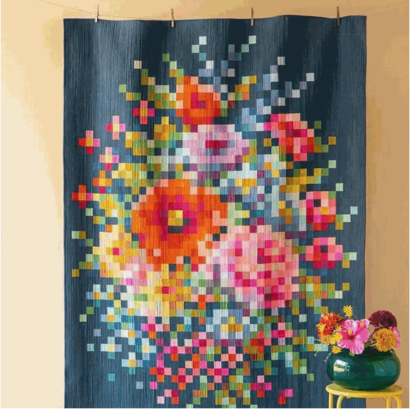 Embroidery Flower Quilt Kit colorful pixelated floral design on dark peacock background hanging on wall