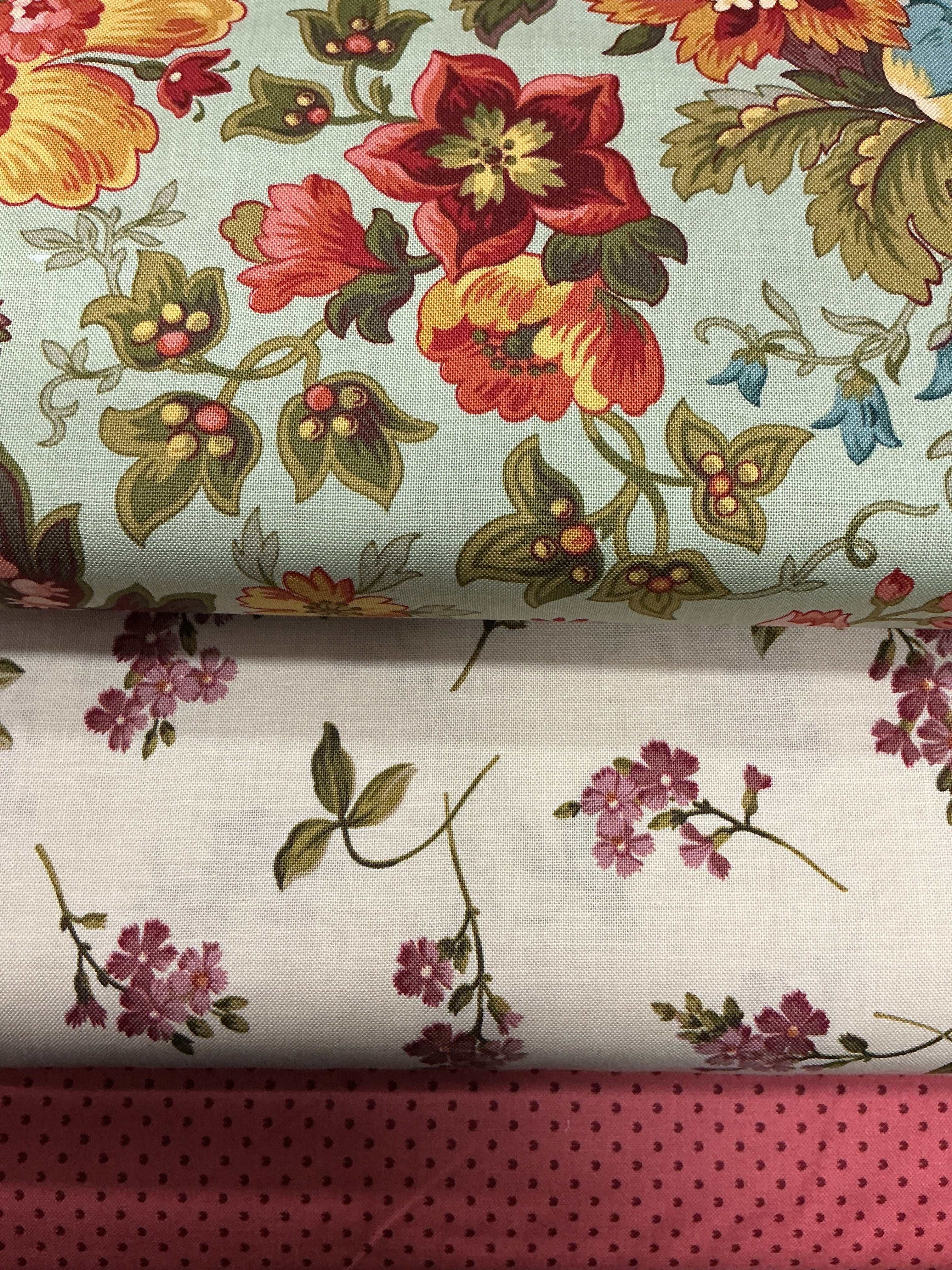 Three coordinating fabrics from Bella Rose Quilts 3 Yard Quilt Bundle for quilting and sewing projects