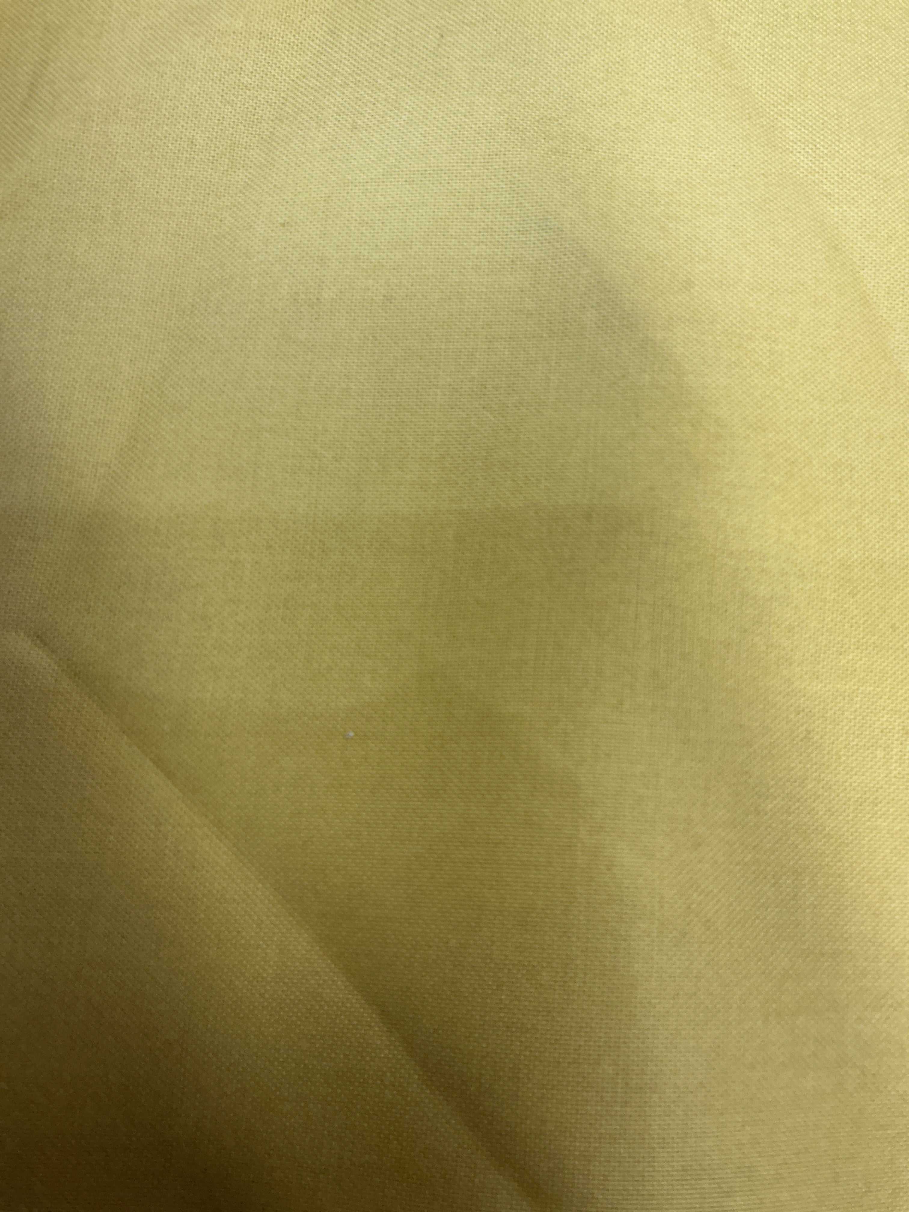 Stack of colorful 5-yard fabric cuts for sale