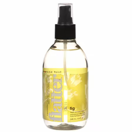 Flatter 8 oz Fig scented fabric smoothing spray by Soak Wash in clear spray bottle