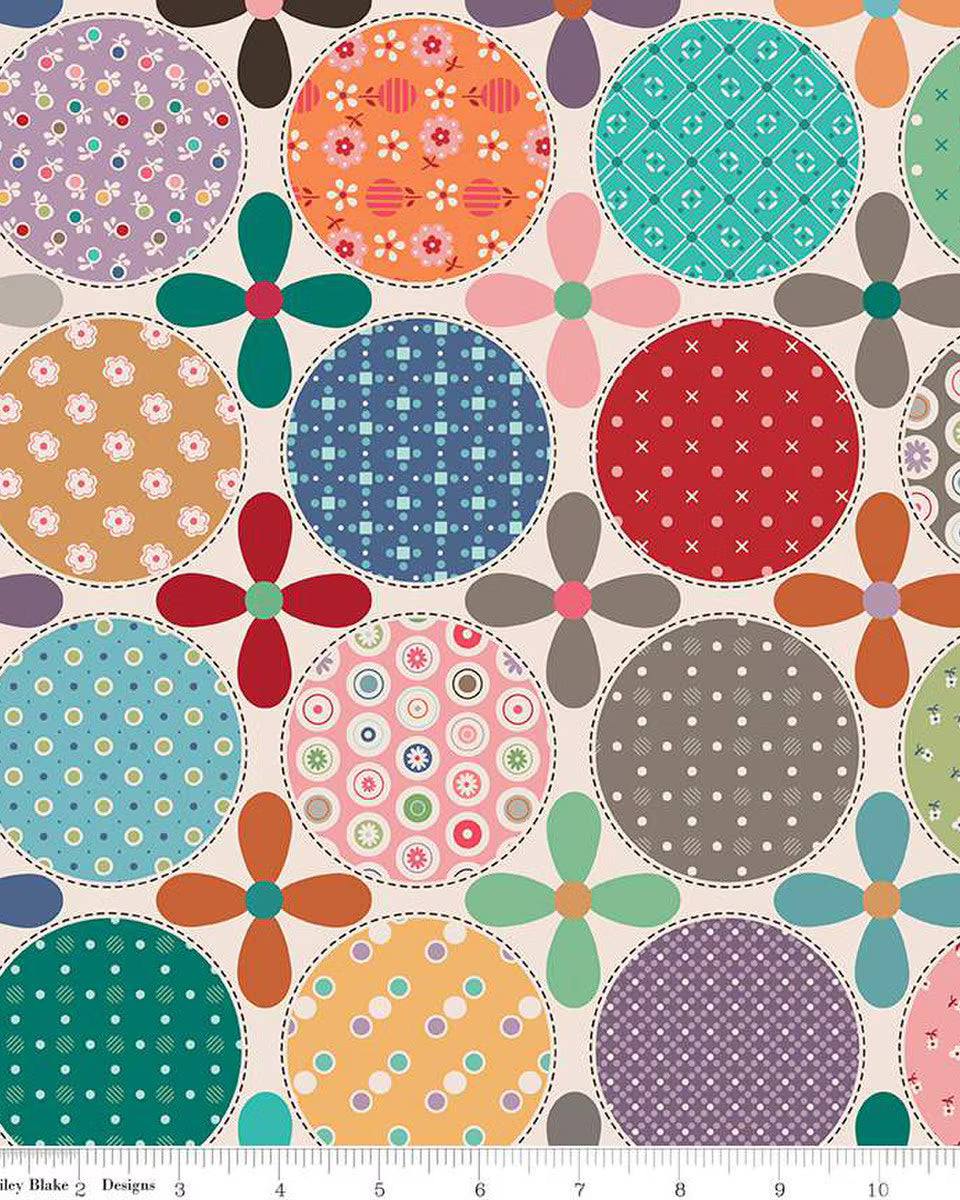 Bee Dots Home Décor fabric with multi-colored daisy dots by Lori Holt, lightweight canvas for home projects