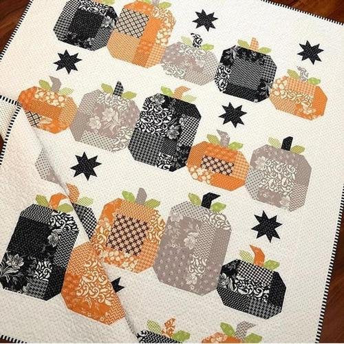 Hocus Pocus Quilt Kit featuring fall-themed Fig Tree Fabrics by Joanna Figueroa with pumpkins and foliage design