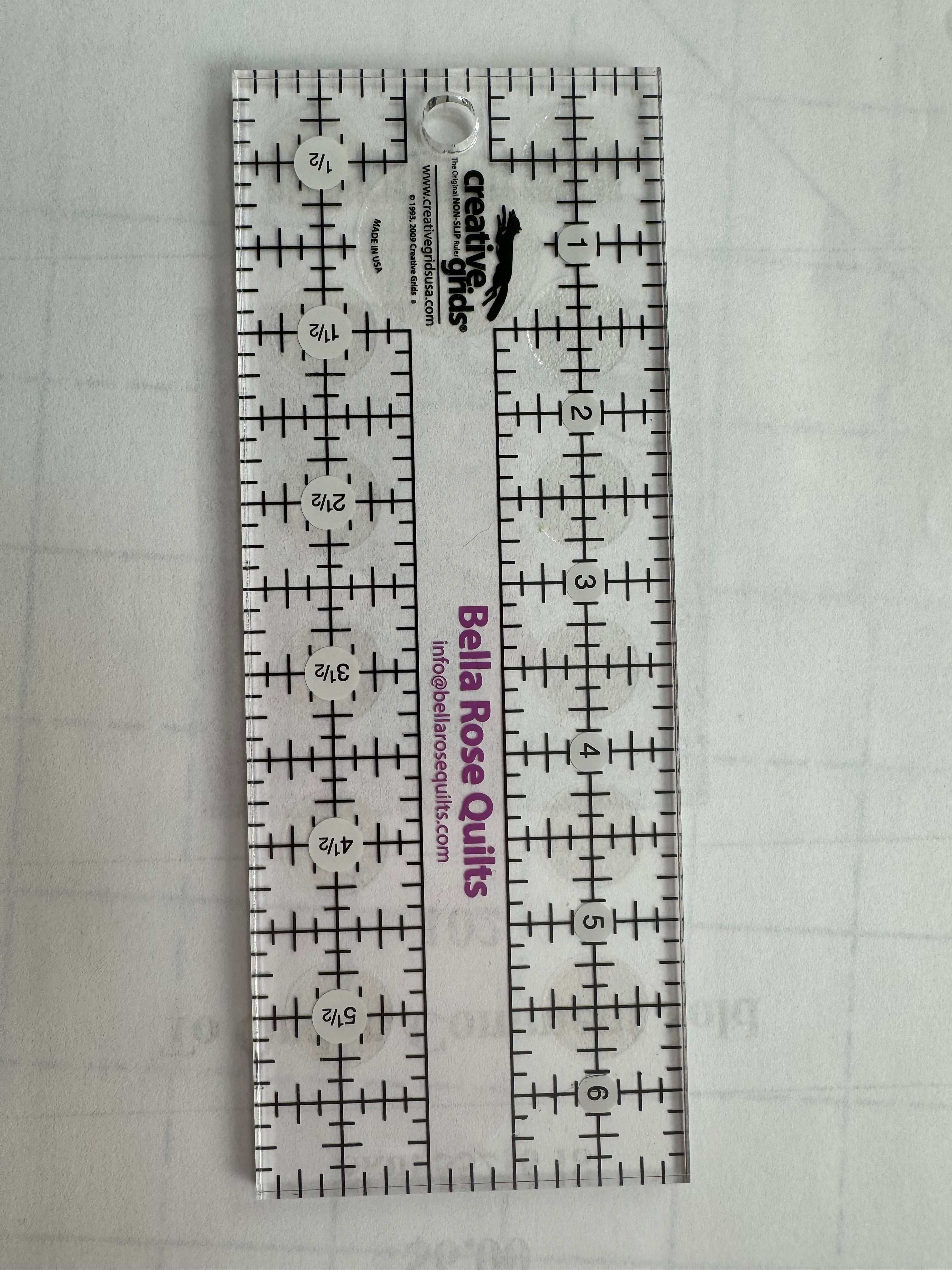 Bella Rose Quilts Creative Grid ruler 2.5x6.5 inches with black and white markings for quilting and fabric cutting