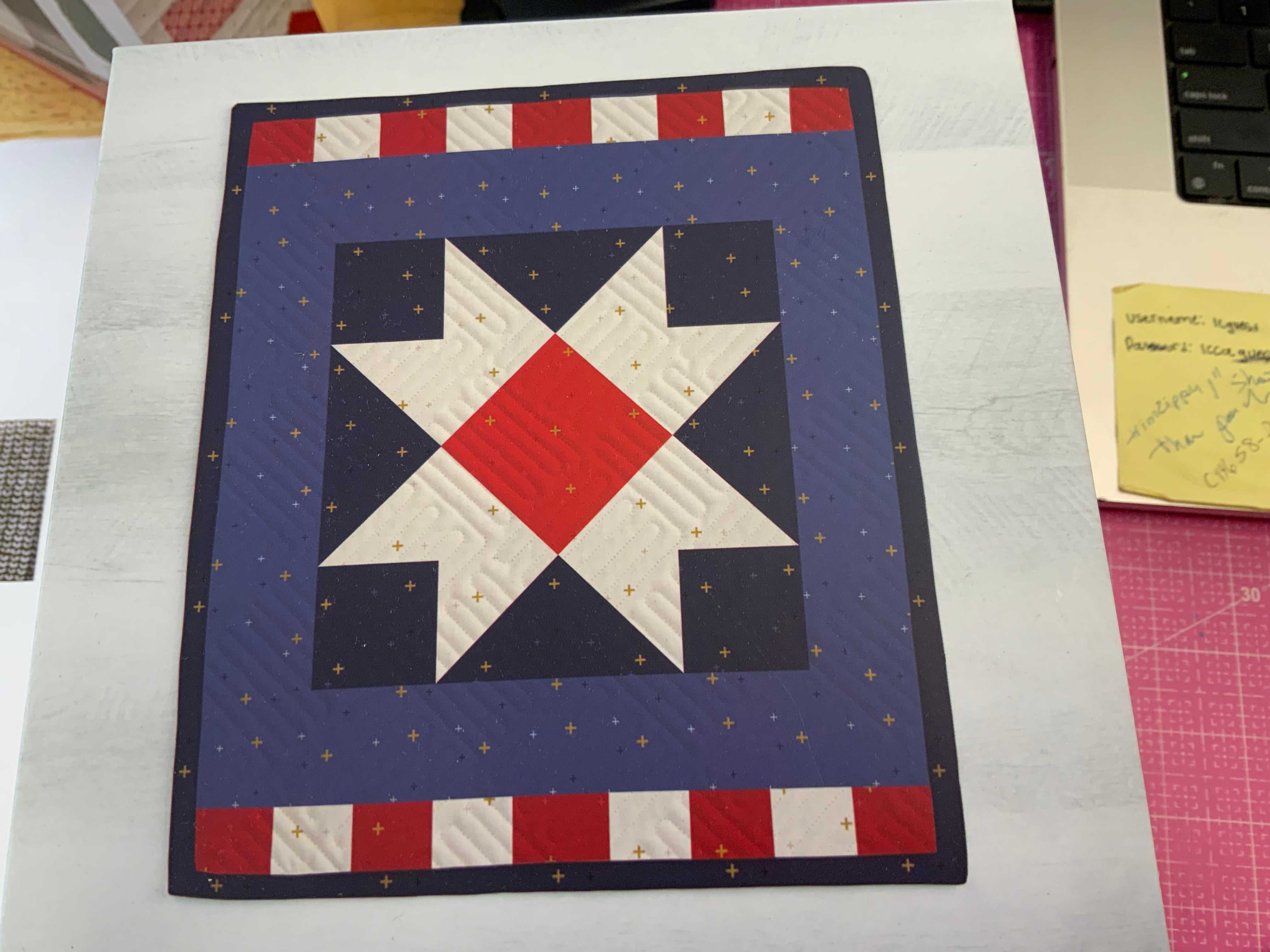 Star spangled table topper quilt kit with red, white, and blue star design