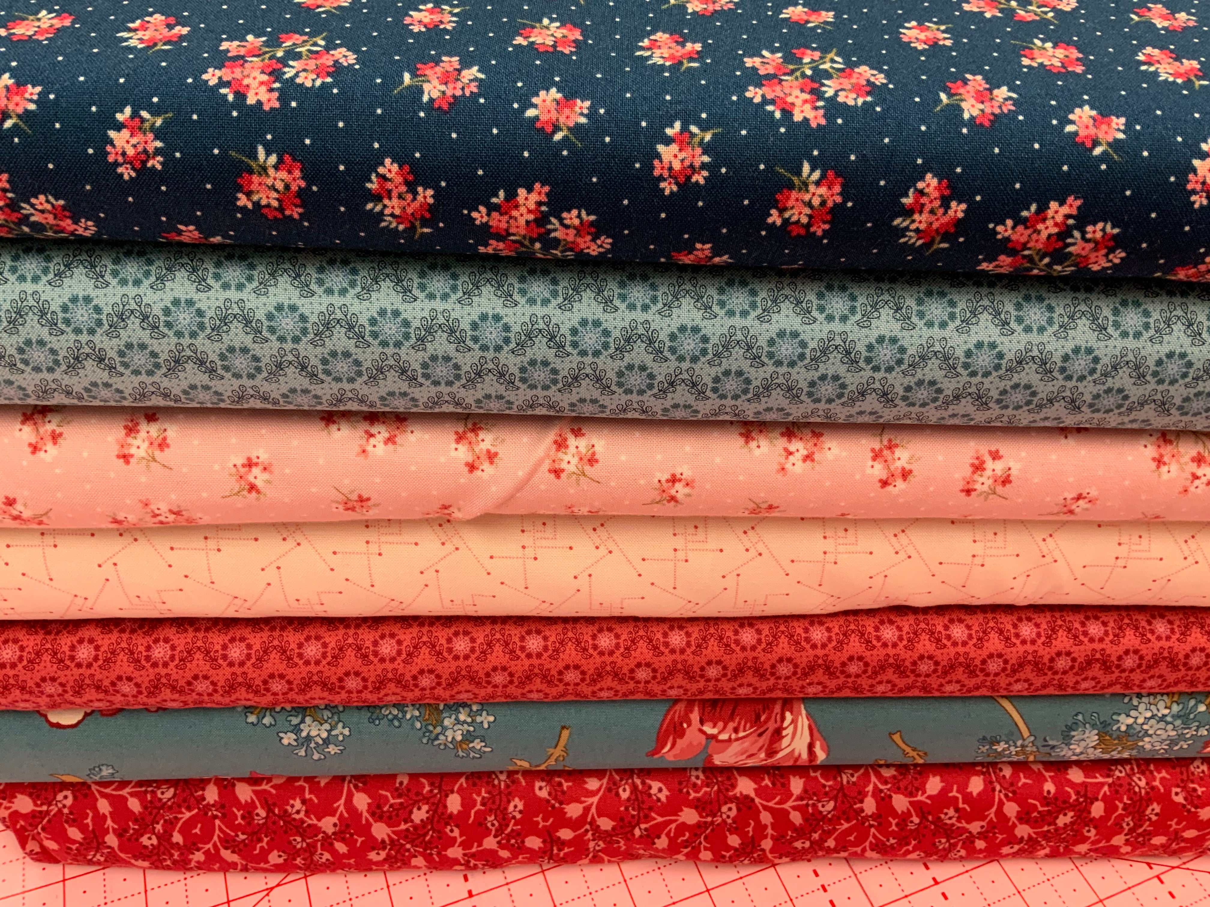 M50 Island Hopping Kit fabrics with floral and geometric patterns curated by Bella Rose Quilts