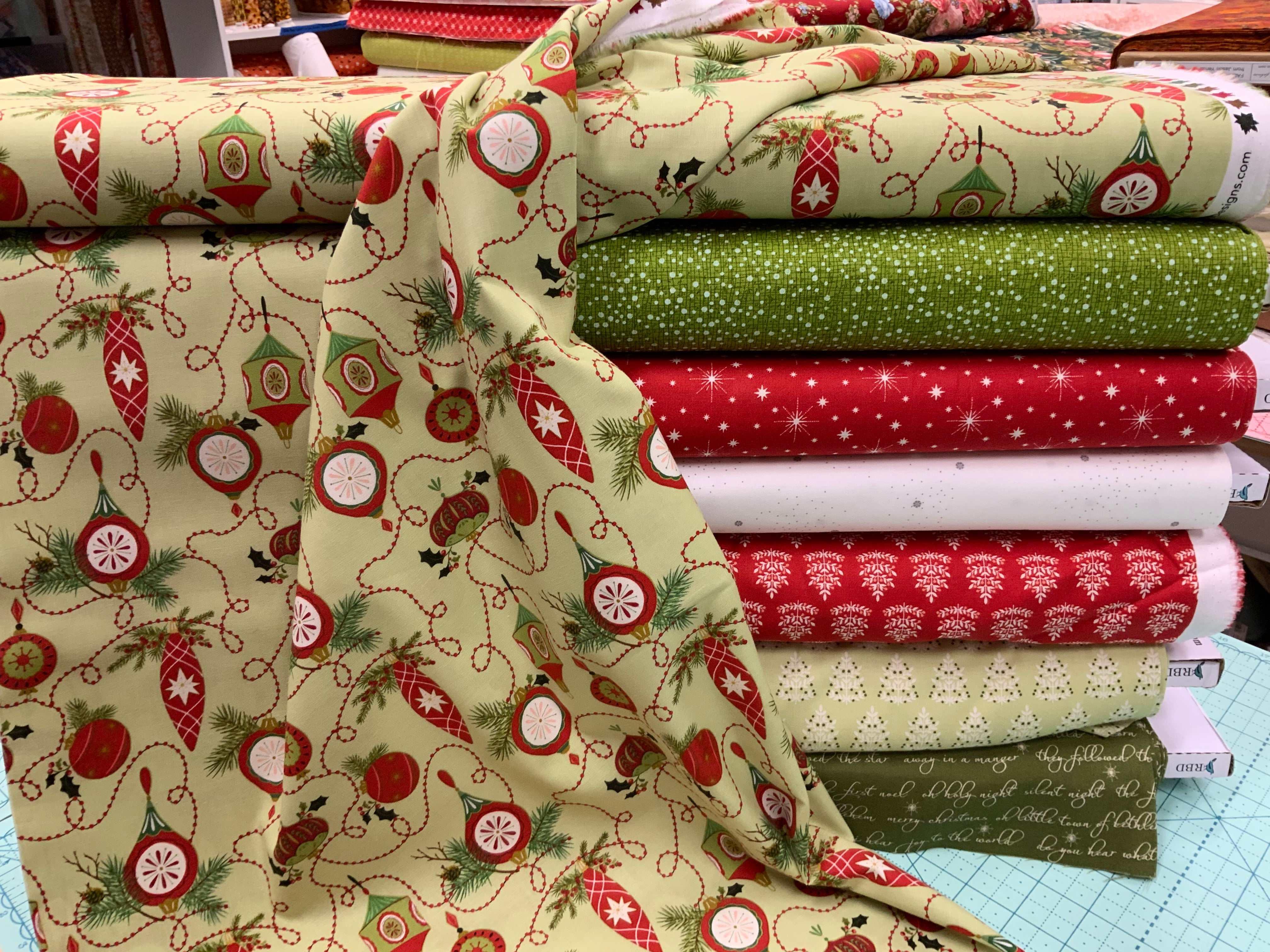 M50 Island Hopping Kit fabric bundle with festive red, green, and white quilt fabrics curated by Bella Rose Quilts