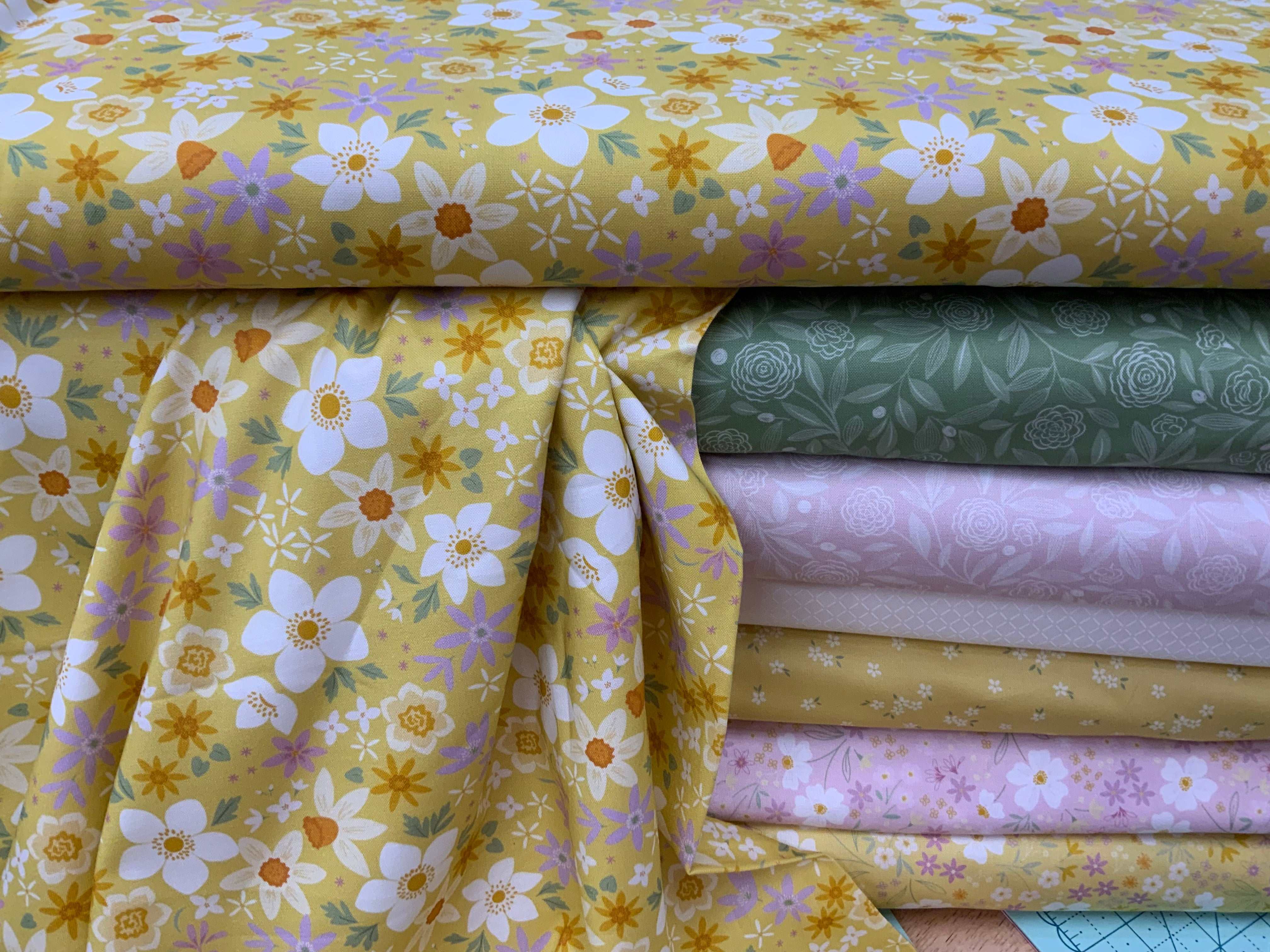 M50 Island Hopping Kit floral fabric bundle curated by Bella Rose Quilts with yellow, green, and pink tones