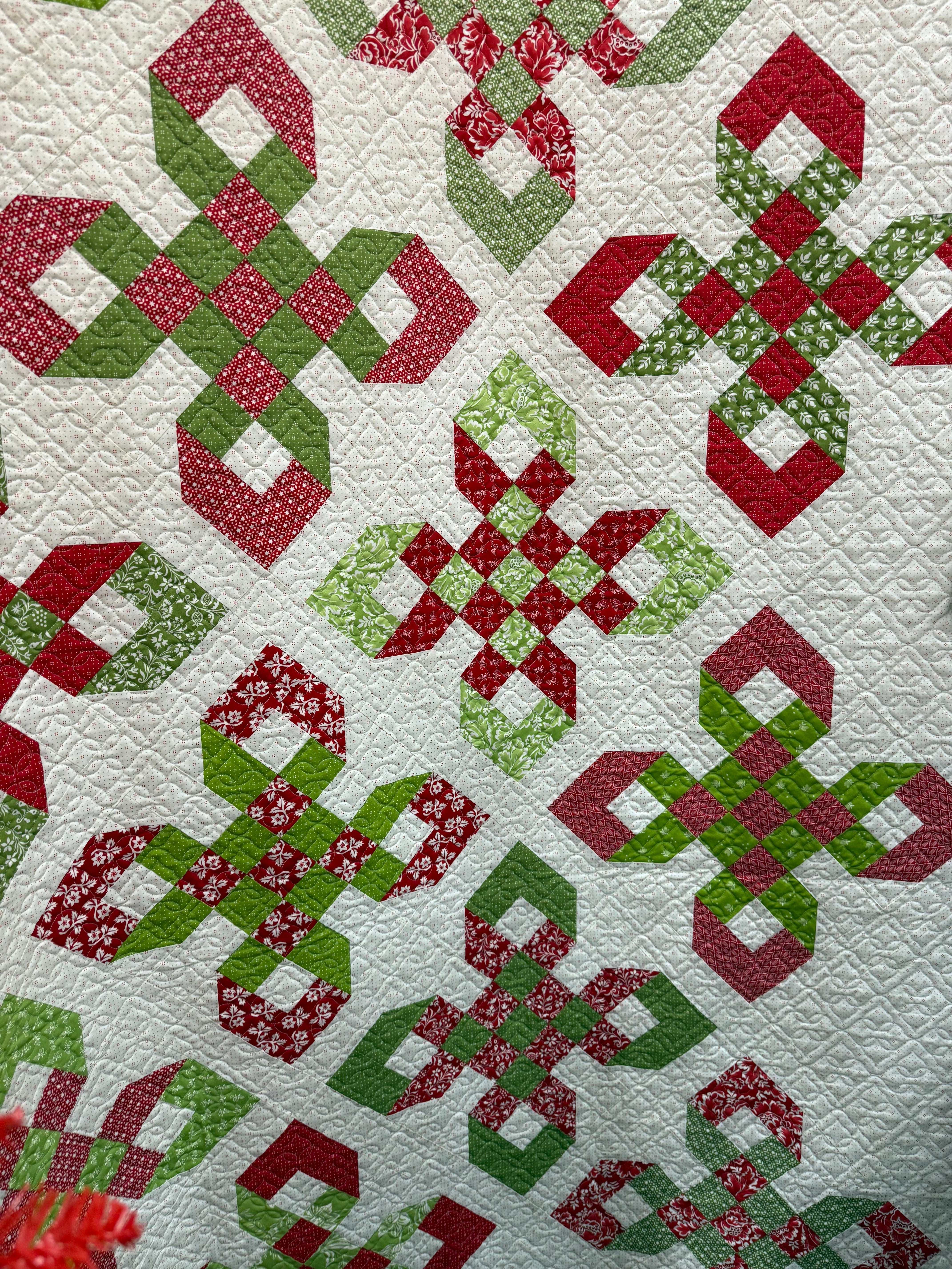 English Knot Quilt Kit featuring Buon Natale fabric in red and green holiday design quilt top
