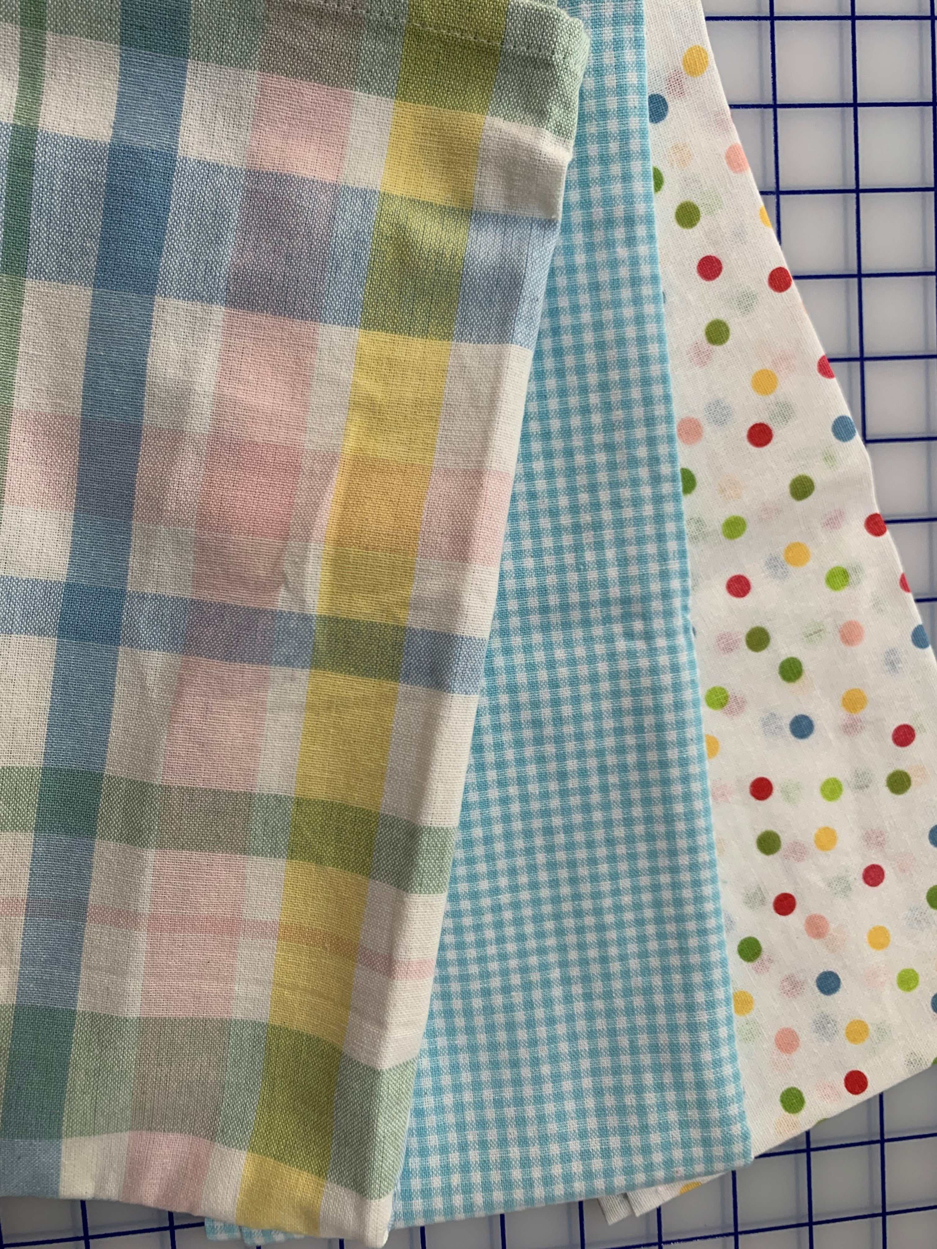 Printed patterned kitchen towels with pastel plaid, mini check, and polka dot designs in 100% cotton