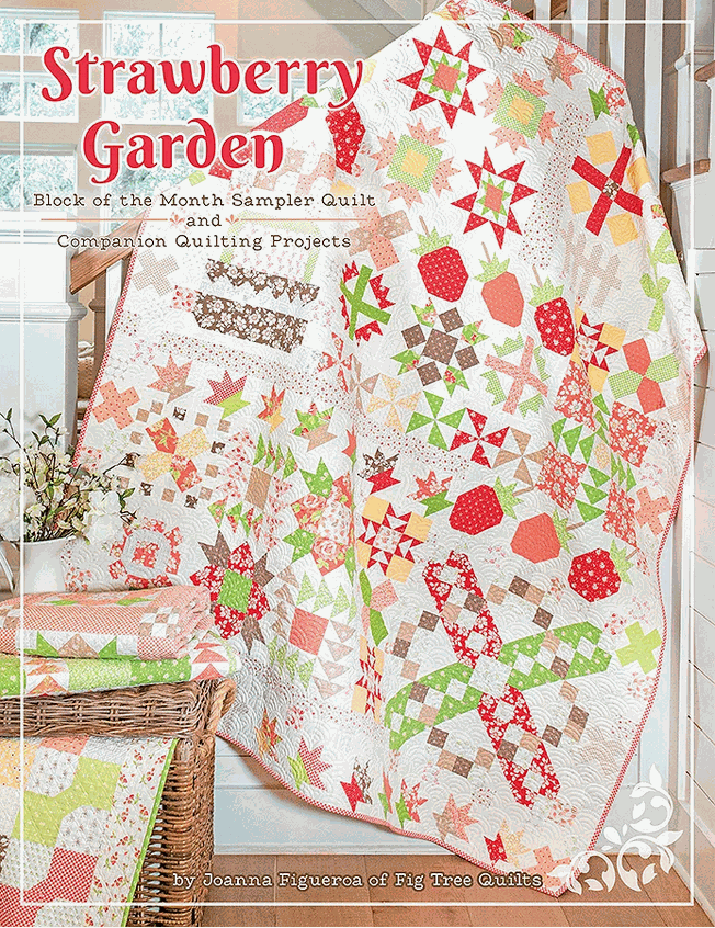 Strawberry Garden Quilt Book featuring colorful quilt blocks with strawberries and garden motifs