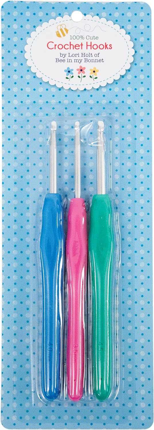 Lori Holt's 3 Piece Crochet Hook Set with blue, pink, and green handles on polka dot packaging