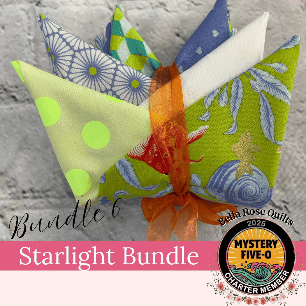 M50 Bella Rose Quilts Starlight 6 Fat Quarter fabric bundle tied with orange ribbon