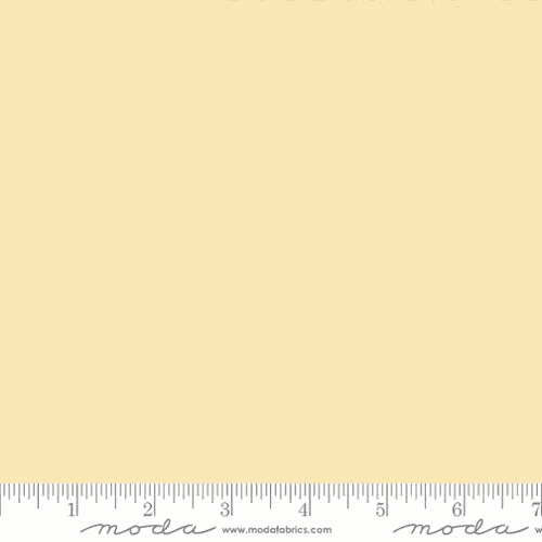 Bella Solids from Moda 9900 28 Butter fabric quarter yard with ruler