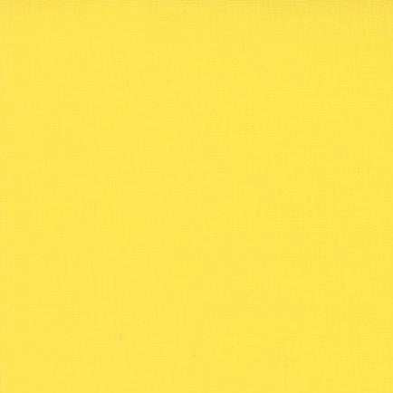 Bella Solids Daffodil 9900 250 solid yellow cotton fabric from Moda Fabrics sold by half-yard increments