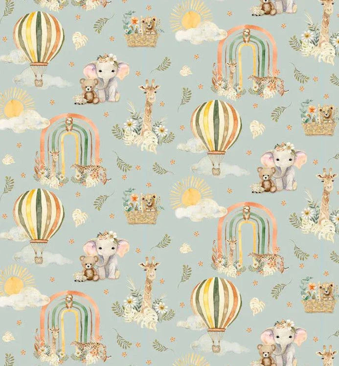 Mini Menagerie Wild Animal fabric with light teal background featuring elephants, giraffes, hot air balloons, rainbows, and clouds.
