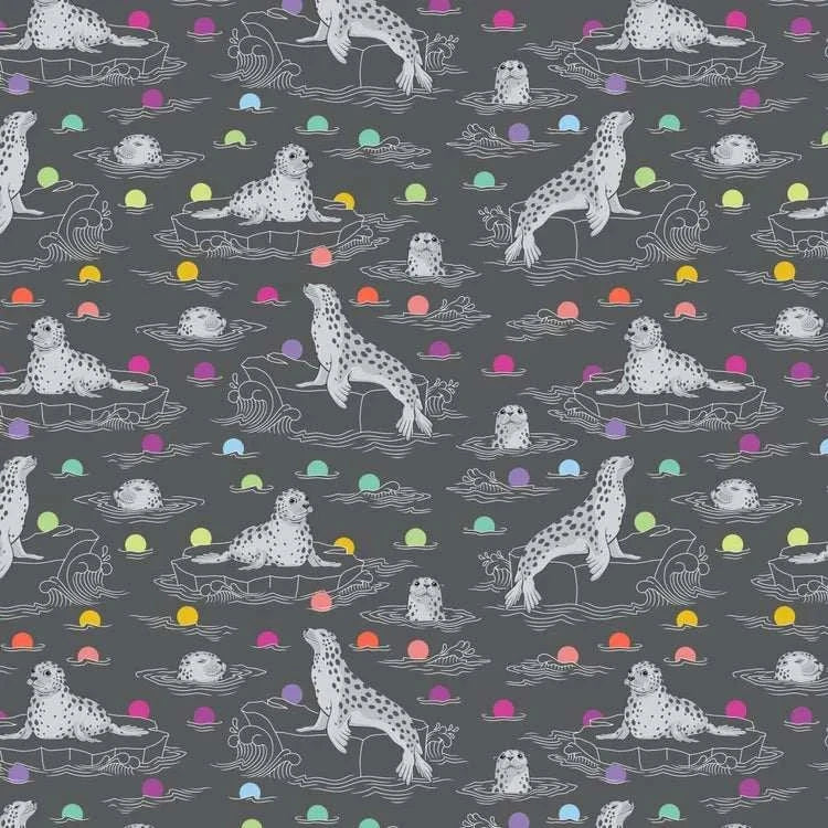 Graywork Seal the Deal carbon fabric by Tula Pink featuring gray seals and colorful dots on dark gray background