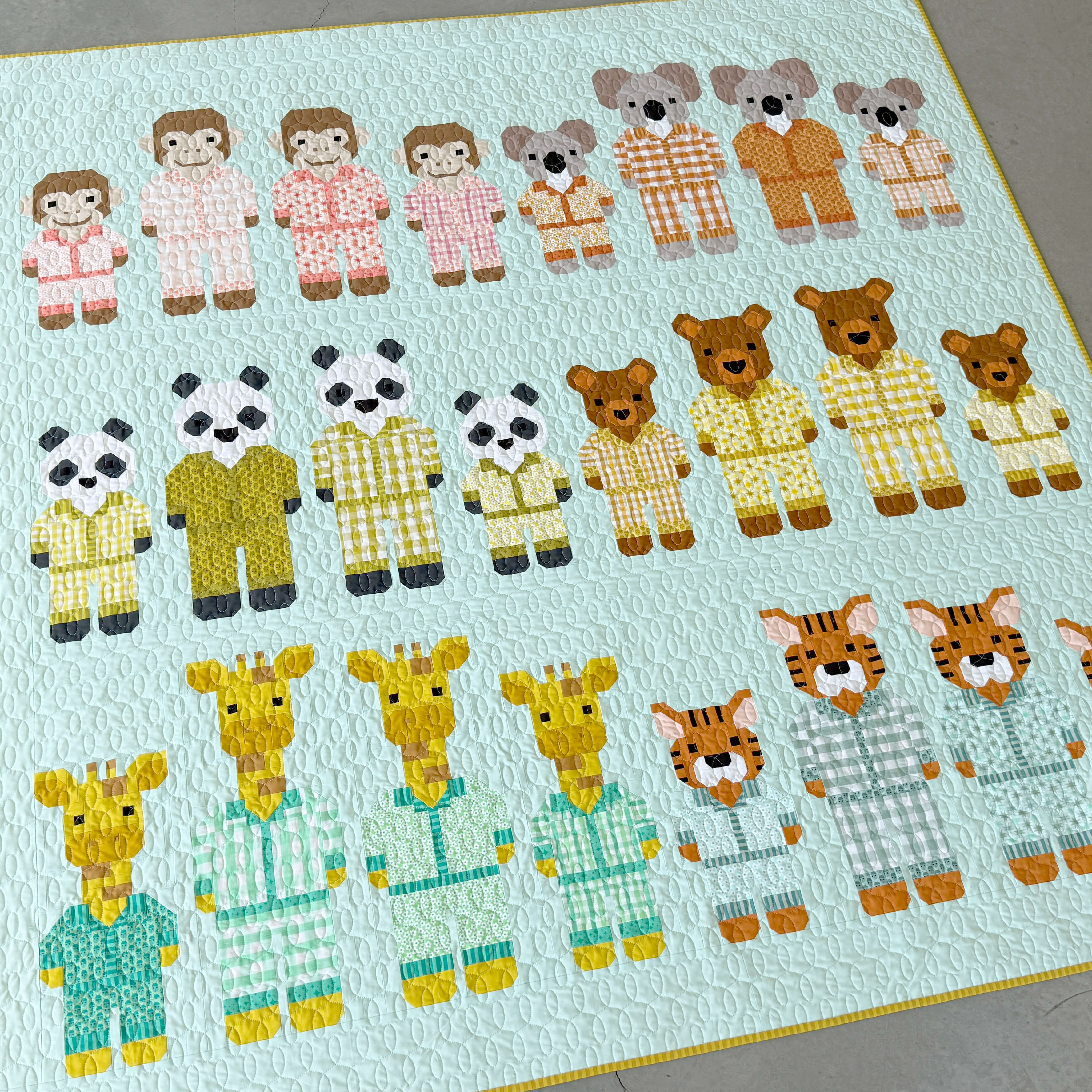 Pajama Party Quilt Kit featuring Popcorn by Elizabeth Hartman with colorful animal and popcorn print fabrics