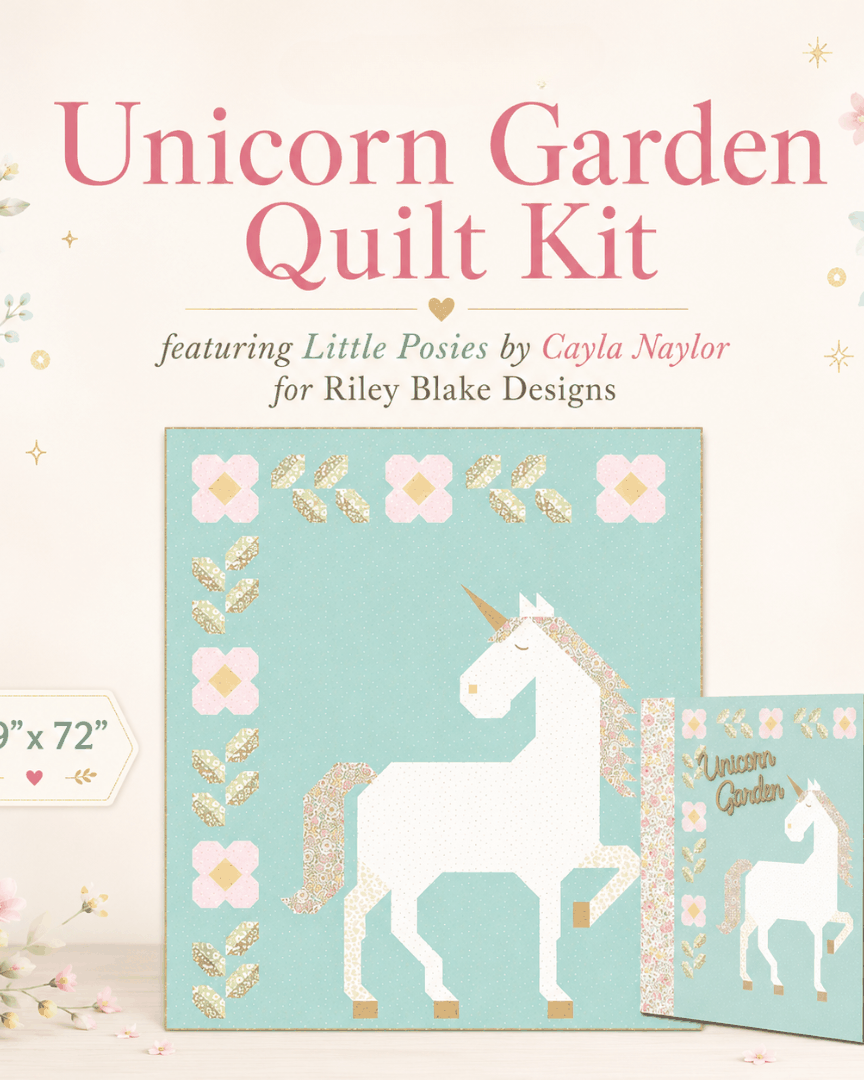 Unicorn Garden Quilt Kit with Little Posies fabric by Cayla Naylor showing quilt top and keepsake box