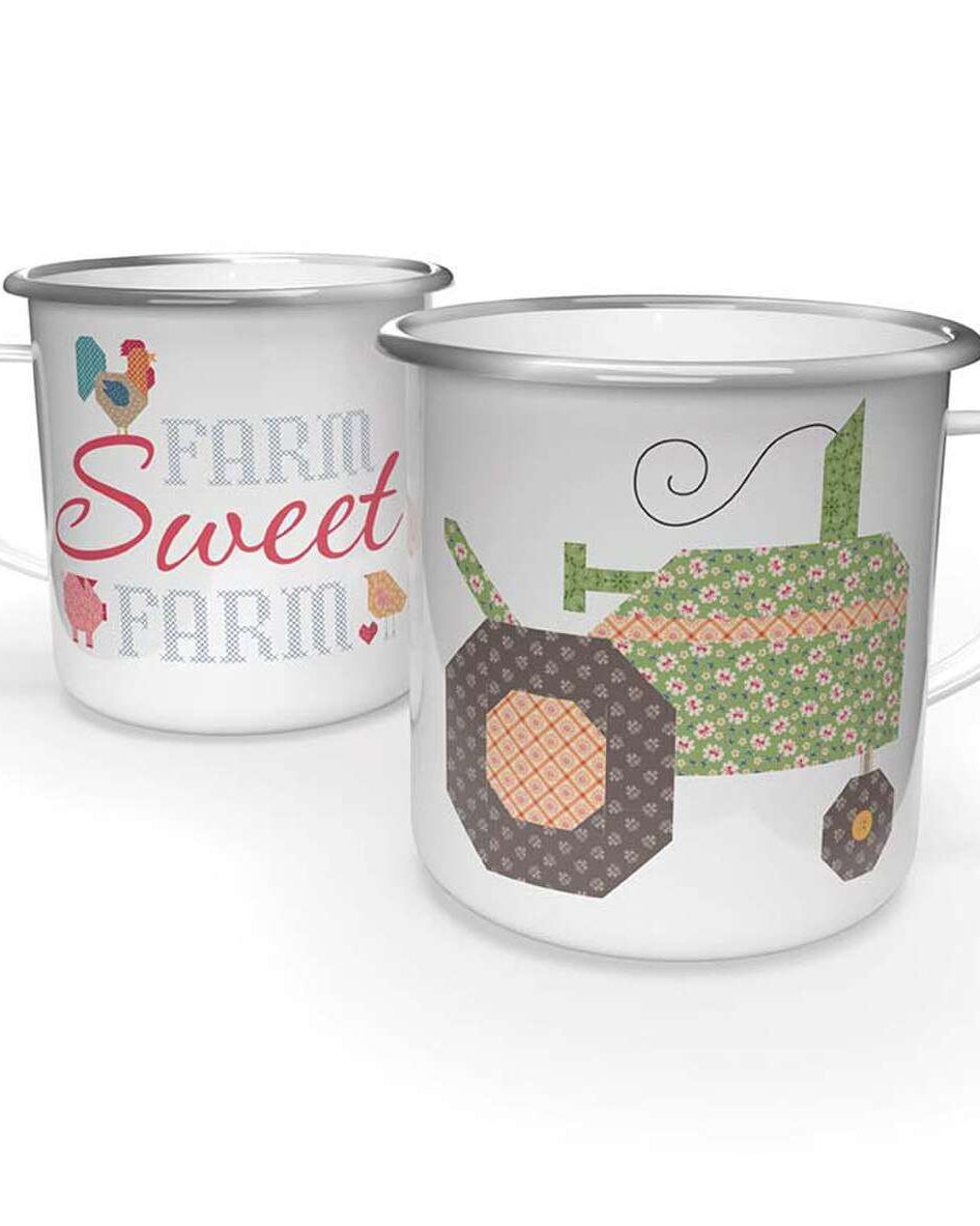 The Famer's Daughter enamel tin mug with farm-themed quilt motif and "Farm Sweet Farm" text design