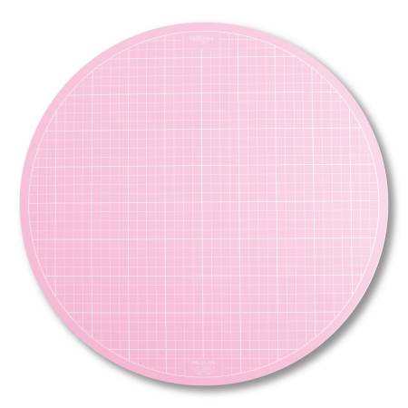 Pink 10 inch rotating cutting mat with grid marks by Sue Daley Designs for quilting and patchwork