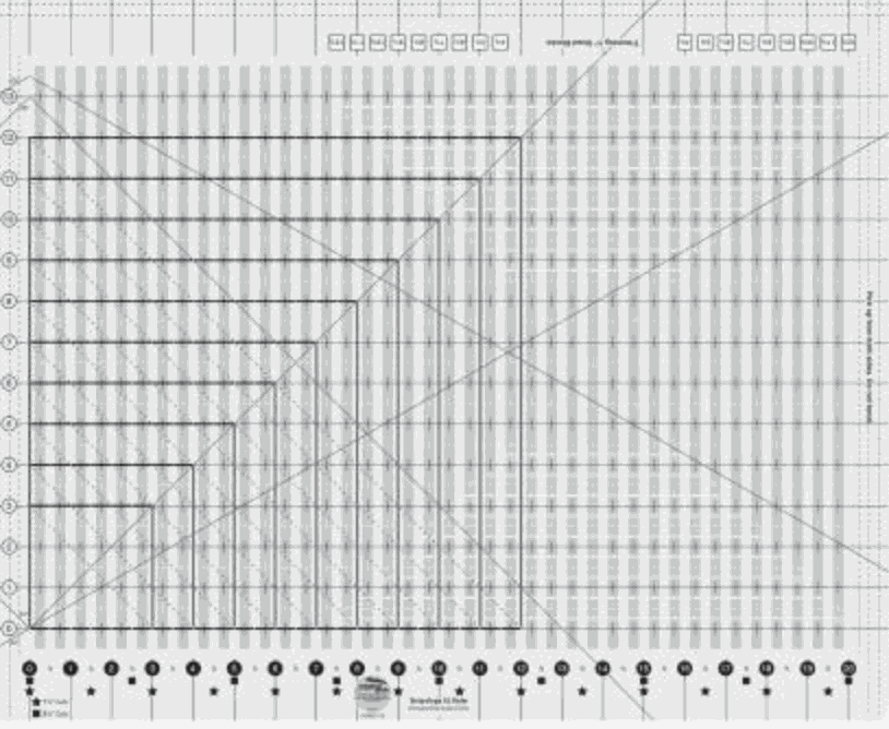 Creative Grids Stripology XL Quilt Ruler with multiple cutting slots and angled markings for quilting precision