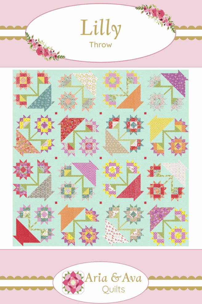Lilly Quilt Pattern with colorful floral baskets and warm tones by Aria and Ava Quilts, 75-inch square throw design