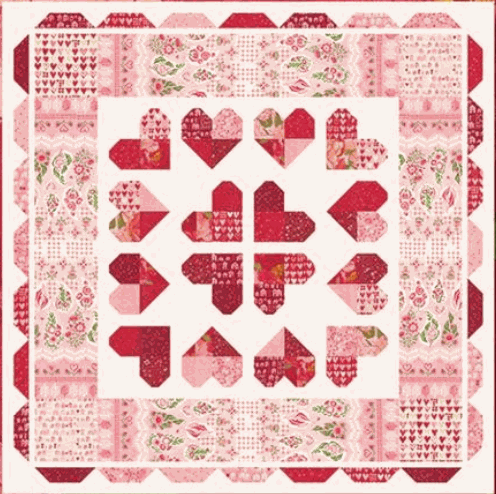 Heart of the Matter Quilt Kit featuring Darling Peony quilt top with pink and red heart and floral patterns, 65x65 inches