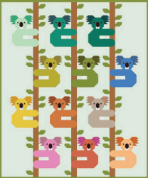 Koalas Quilt Kit by Elizabeth Hartman with Bella Solids fabric, 65x78 inches, featuring colorful koalas on trees pattern