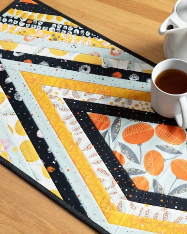 Log Jam Runner Quilt-As-You-Go Batting Kit for 14.5x42 inch table runner with fusible printed batting and full-color pattern
