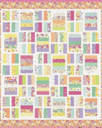 Jelly Bar Quilt Kit featuring Joysome by Corey Yoder with colorful patchwork design and fabric rolls