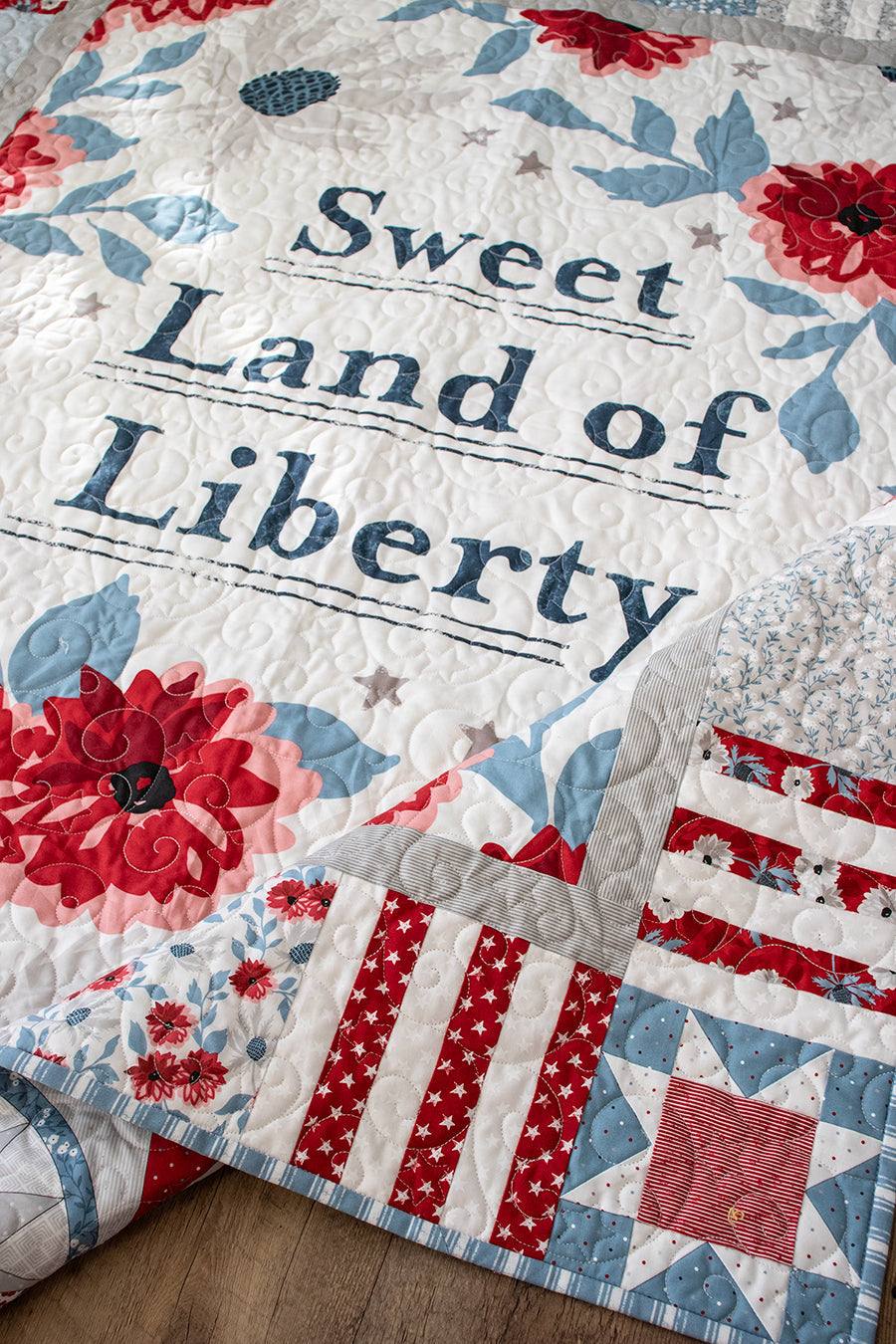 Sweet Land Quilt Kit featuring patriotic Old Glory design by Lella Boutique for Moda with floral and star patterns