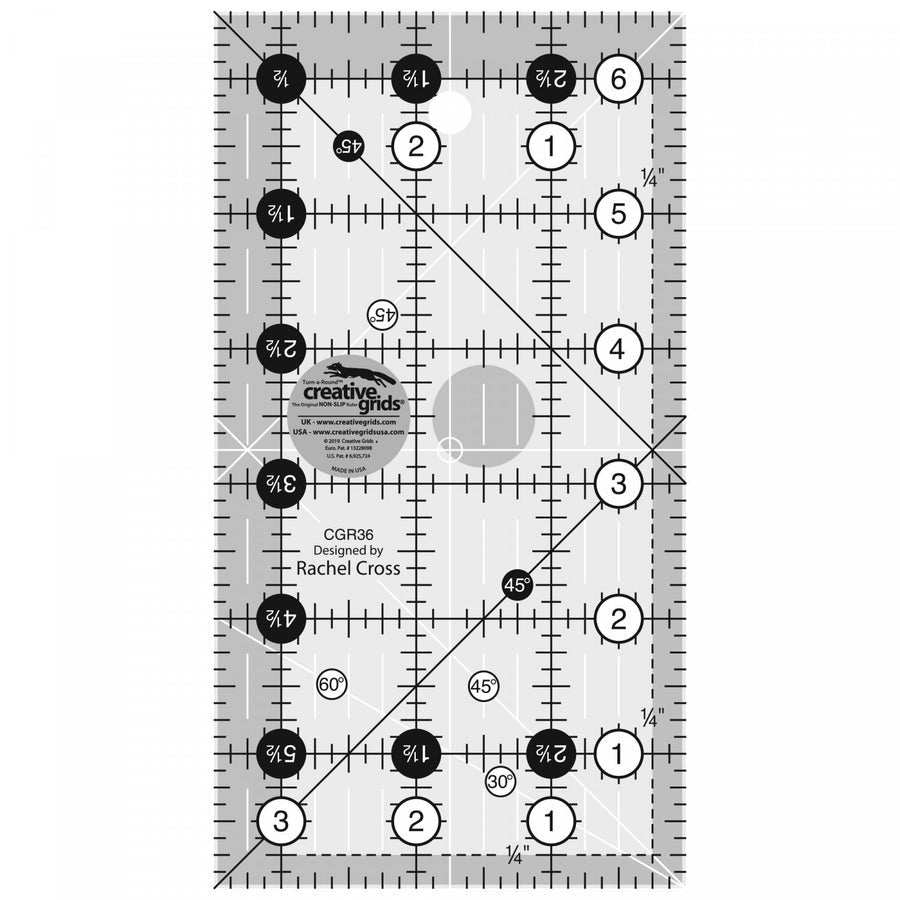 Creative Grids Ruler 3-1/2 x 6-1/2 with black and white markings, 1/8 and 1/4 inch increments, 30-60 degree angles, and non-slip grip for precise fabric cutting.