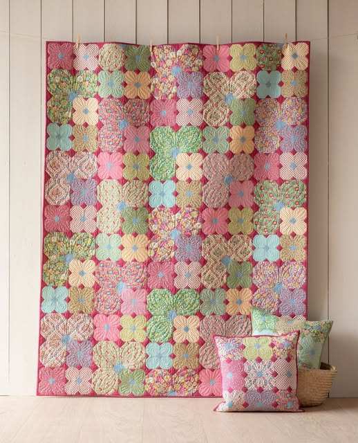 Tilda Wallflower Quilt KIT with colorful floral patchwork quilt and matching pillows by Bella Rose Quilts