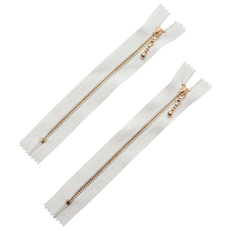 Two 6-inch white macaroon zippers with rose gold droplet pulls, 2 pack