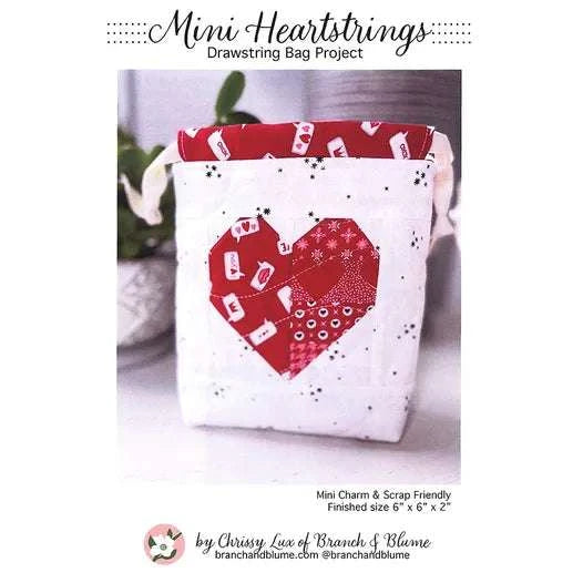 Mini Heartstrings Bag drawstring pattern with red heart design on white fabric by Branch & Bloom