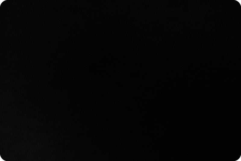 Solid Cuddle® 3 Black minky plush fabric with 3mm pile, ultra-soft and durable polyester textile.