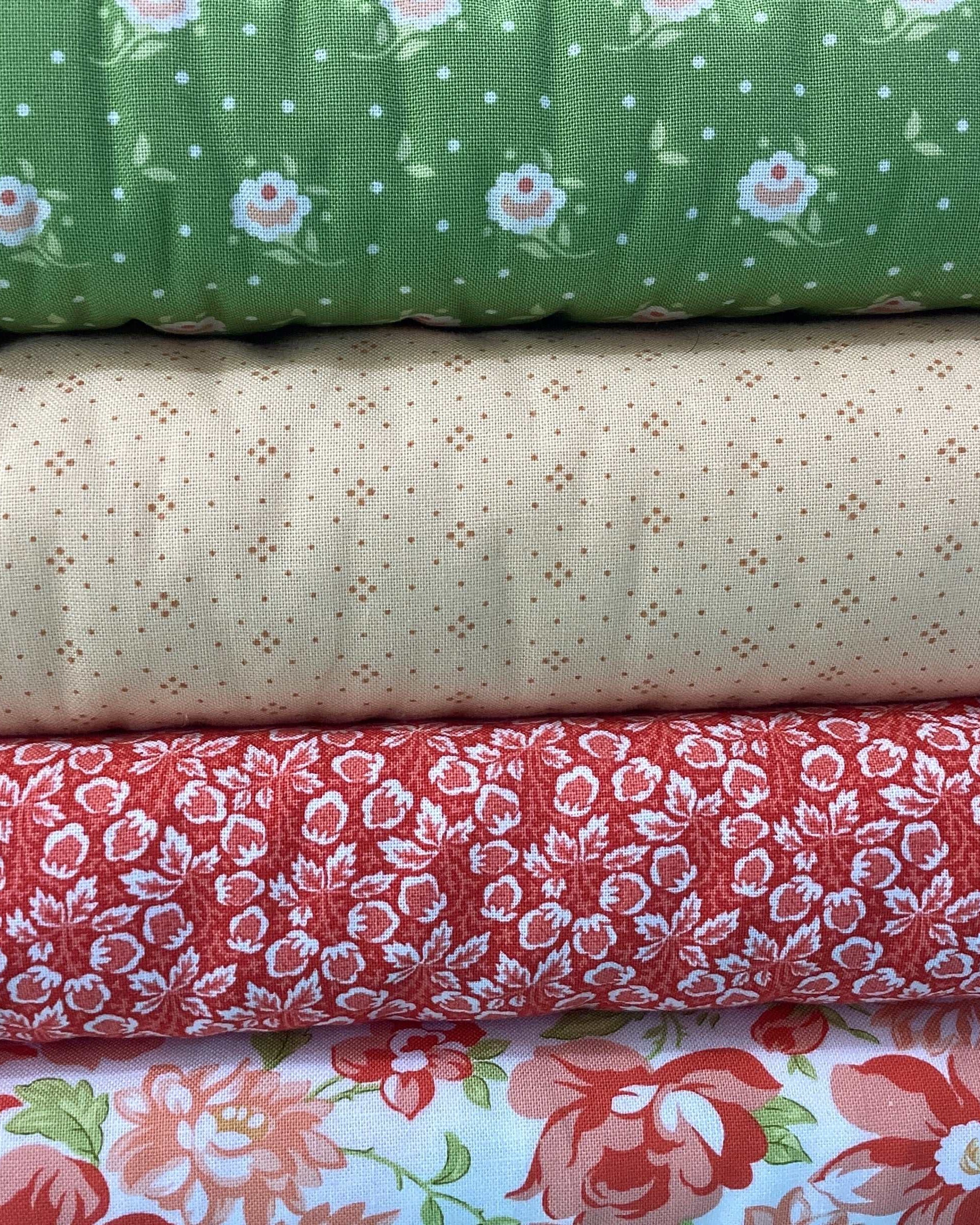4 Yard Quilt Bundle fabric set with green floral, beige dotted, red floral, and multicolor floral patterns