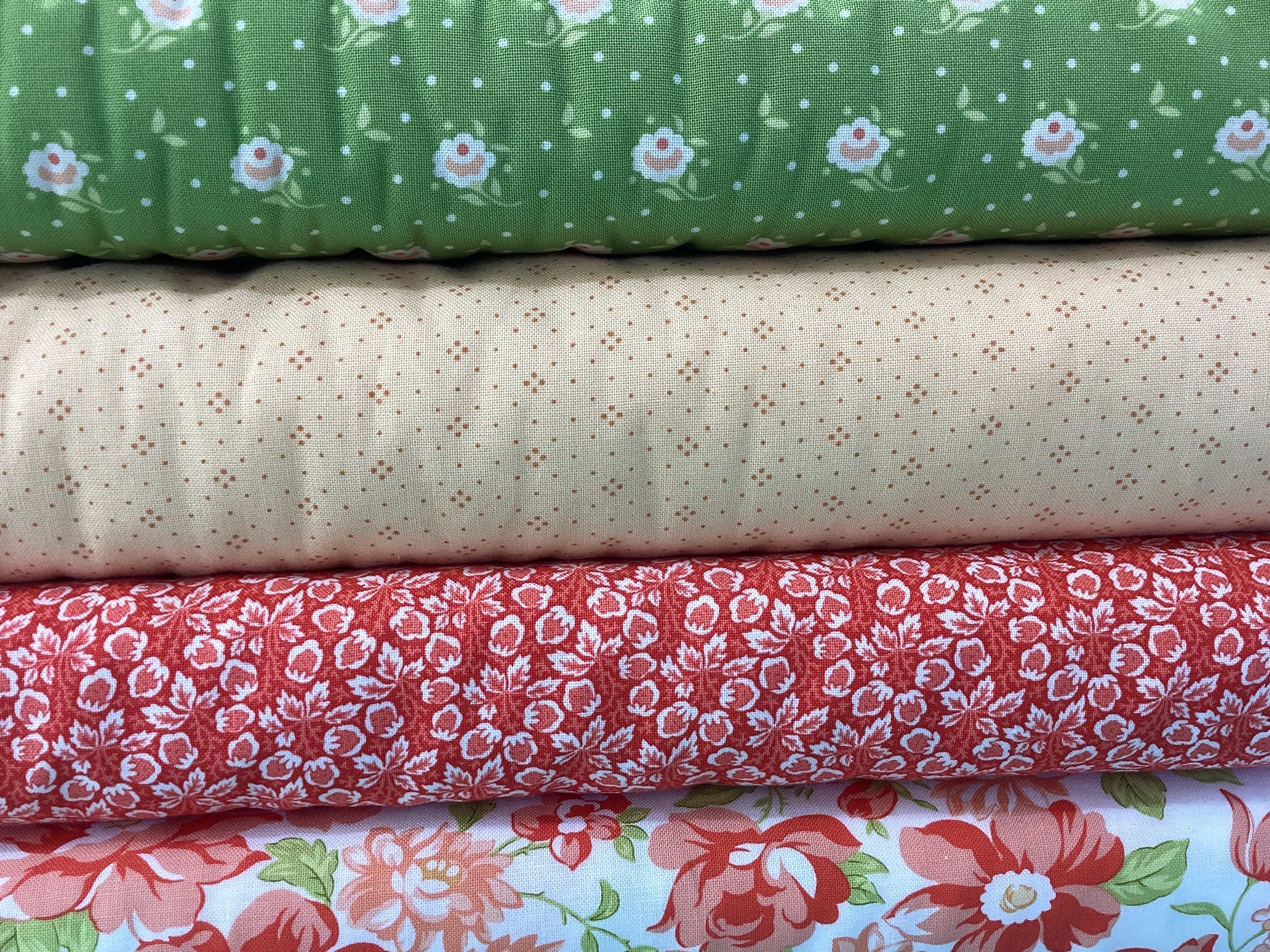 4 Yard Quilt Bundle fabric set with green floral, beige dotted, red floral, and multicolor floral patterns