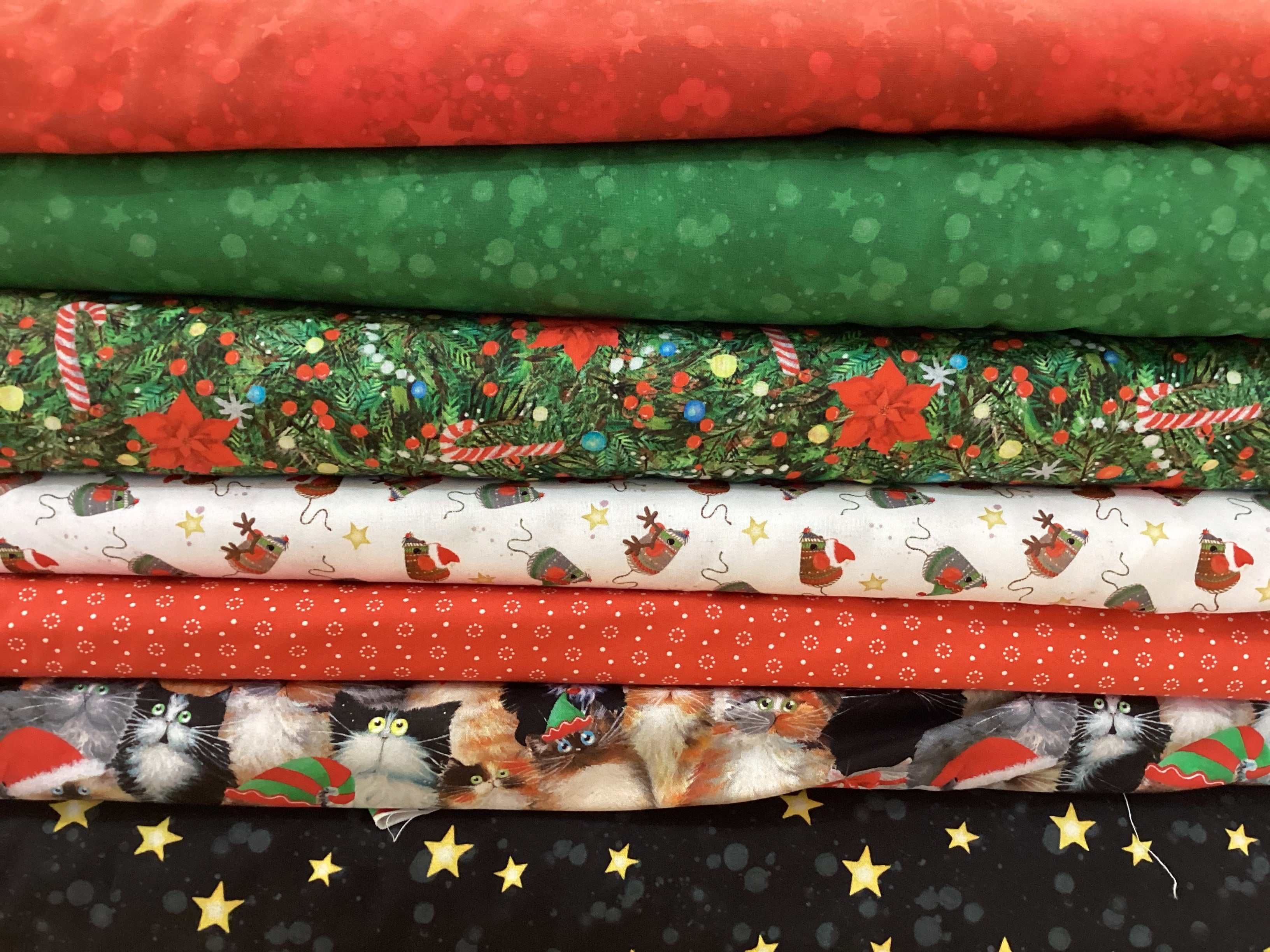 M50 Island Hopping Kit fabric bundle with festive holiday and cat prints for quilting projects