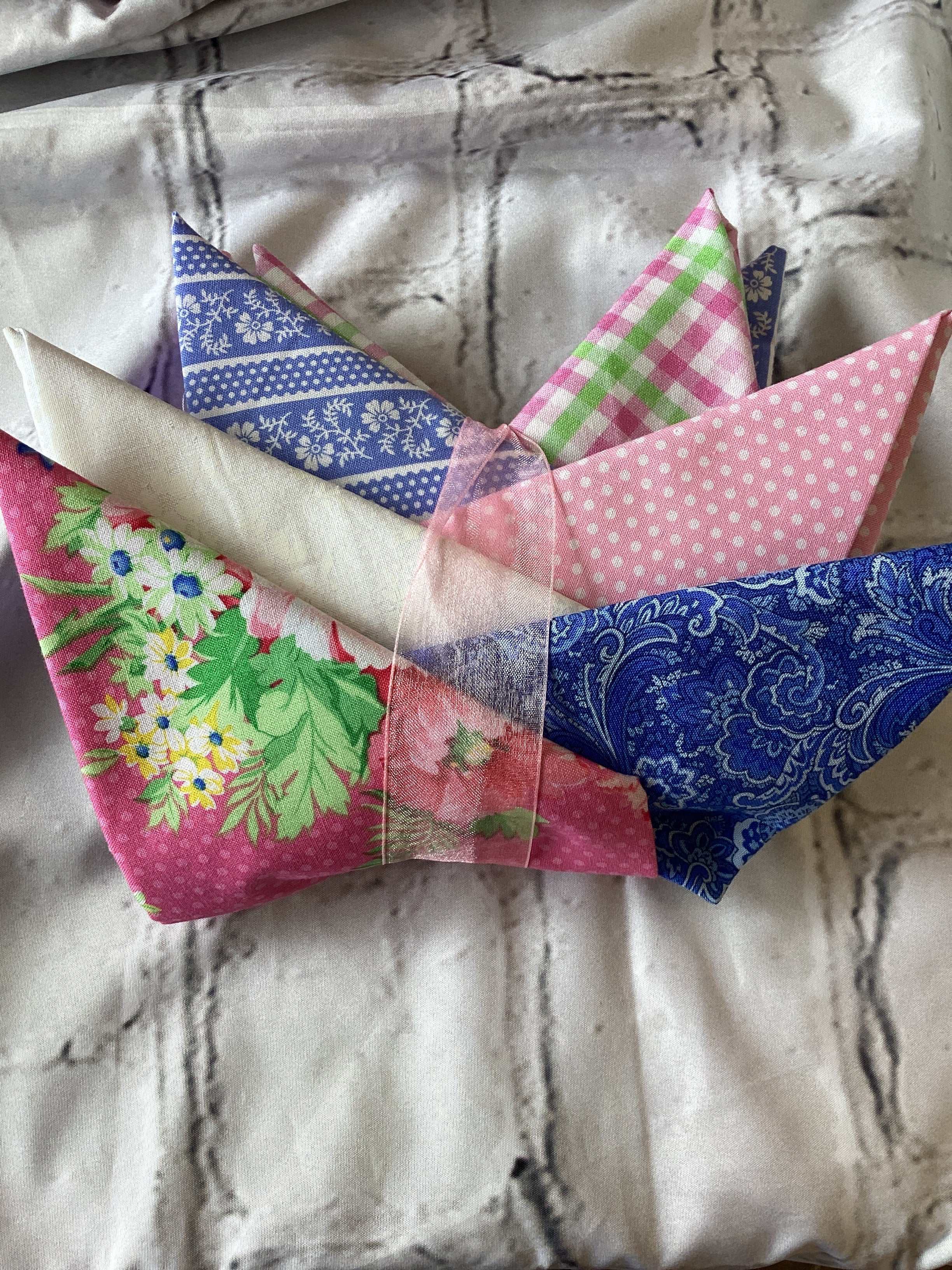 M50 Starry Night Bundle with assorted colorful quilting fabrics wrapped with ribbon