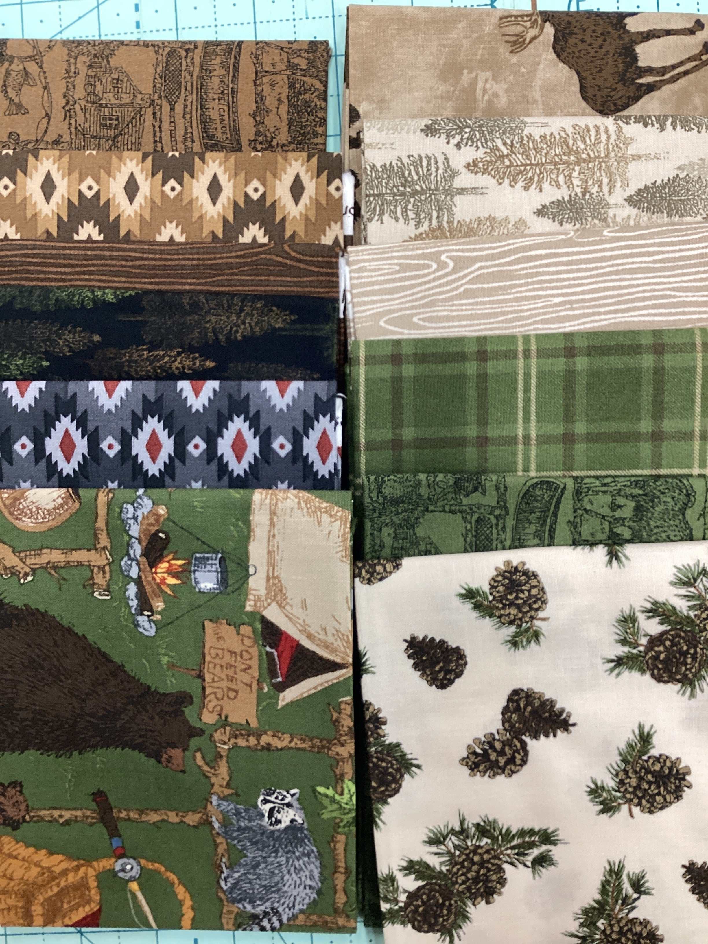12 Fat Quarter Bundle with nature and forest-themed patterns curated by Bella Rose Quilts
