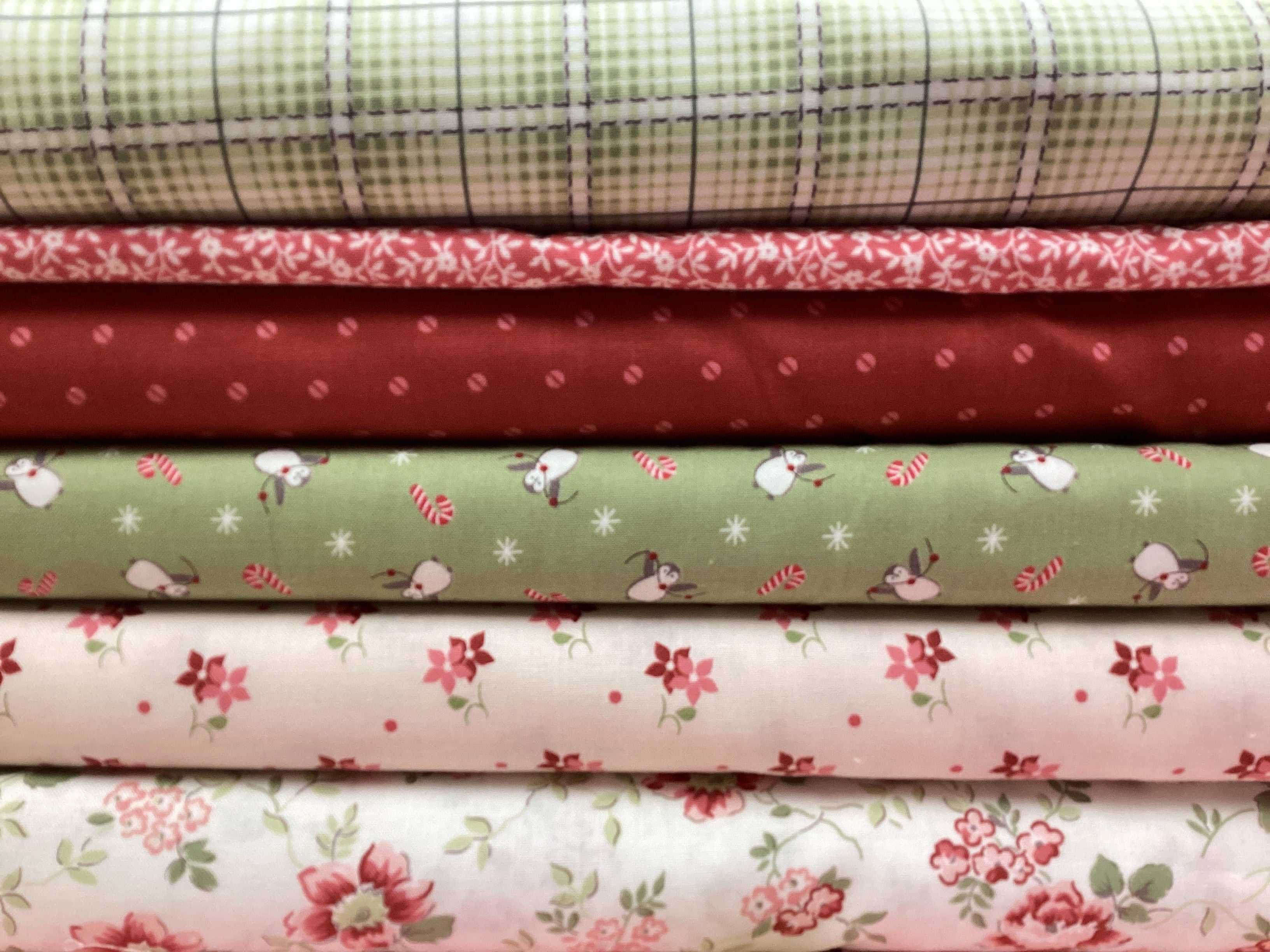 M50 Lucky Break Kit curated fabric bundles with floral, plaid, and festive prints for quilting projects