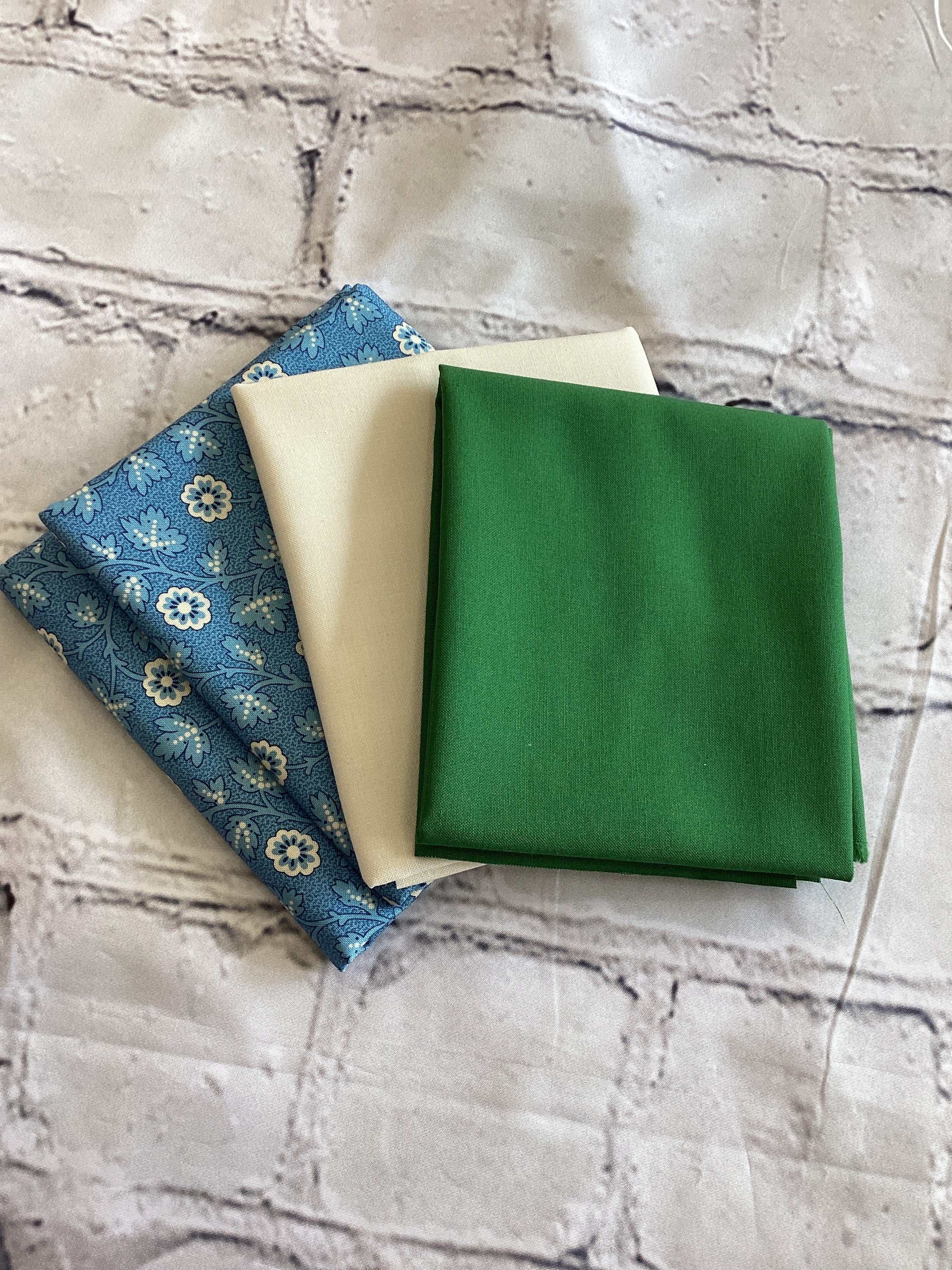 Finishing Kit for Moda with green, cream, and blue floral fabrics for Mini Medallion quilt finishing
