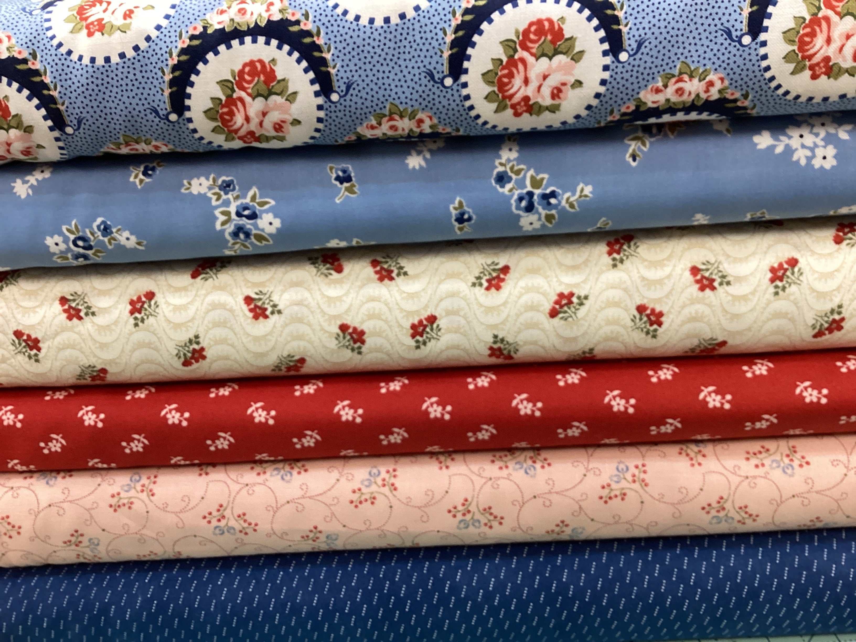 M50 Lucky Break Kit curated fabric bundles with floral and patterned designs for quilting