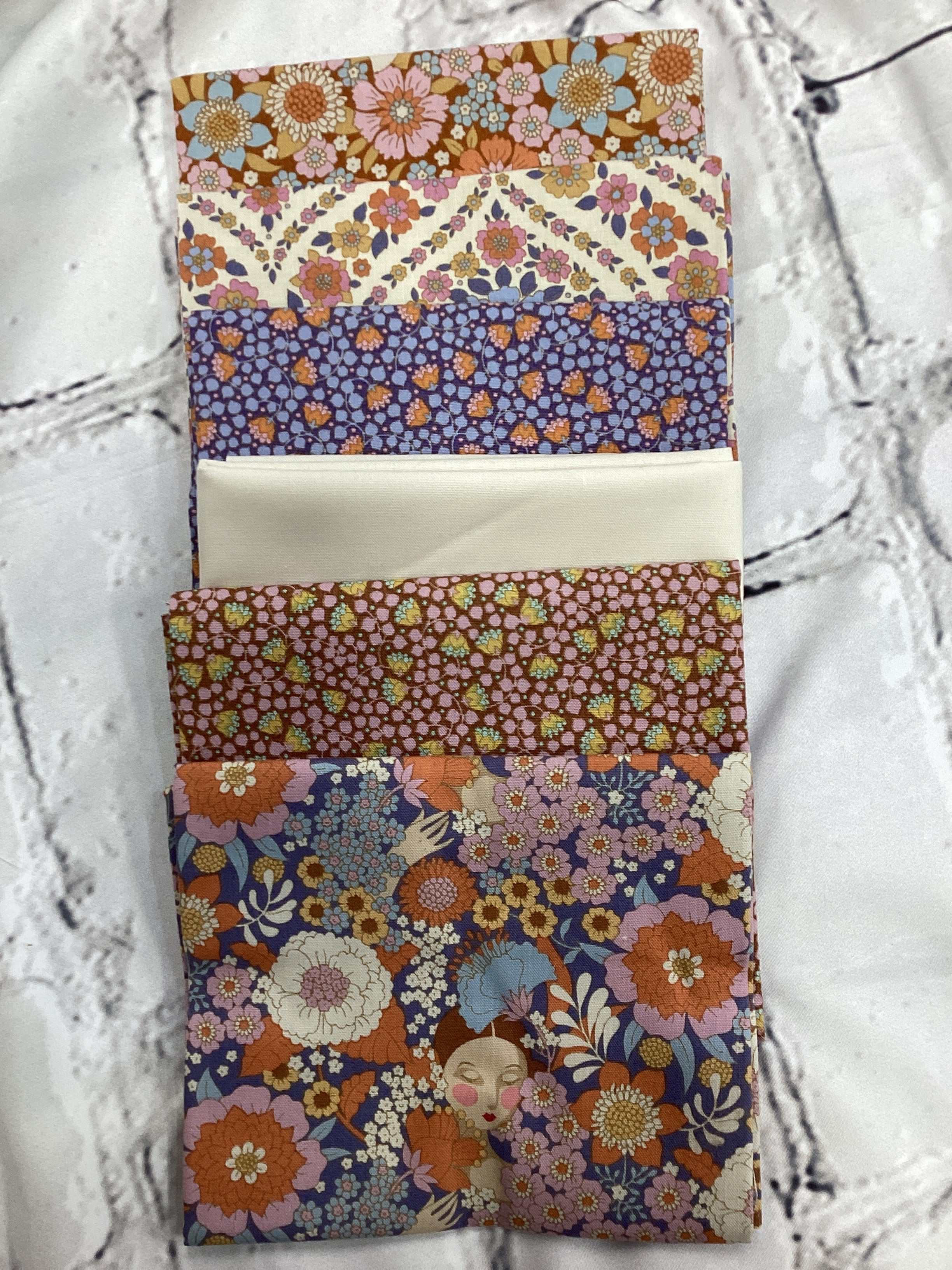 M50 Starry Night Bundle fabric pieces with floral and abstract designs curated by Bella Rose Quilts